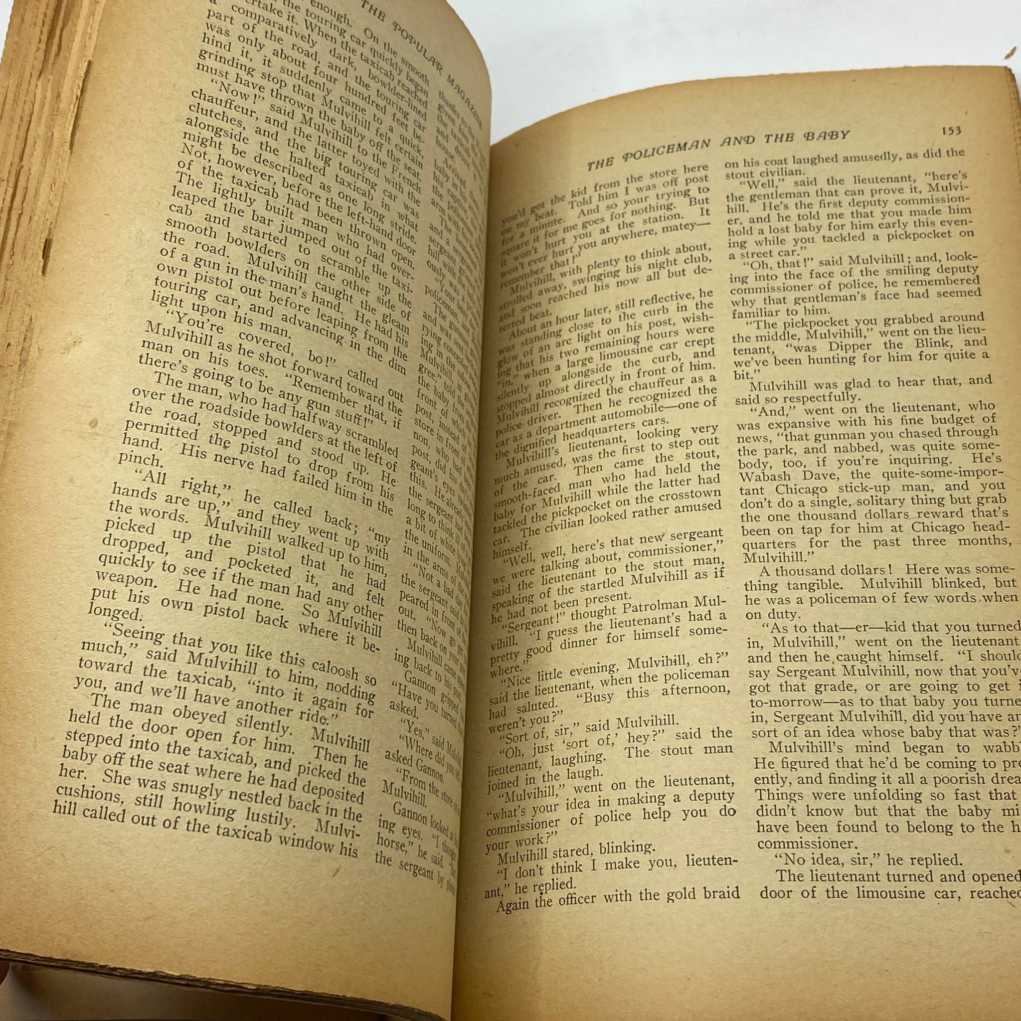 Interior pages of VTG The Popular Magazine February 15, 1913 The Branded Man, showcasing articles with vintage typography and illustrations.