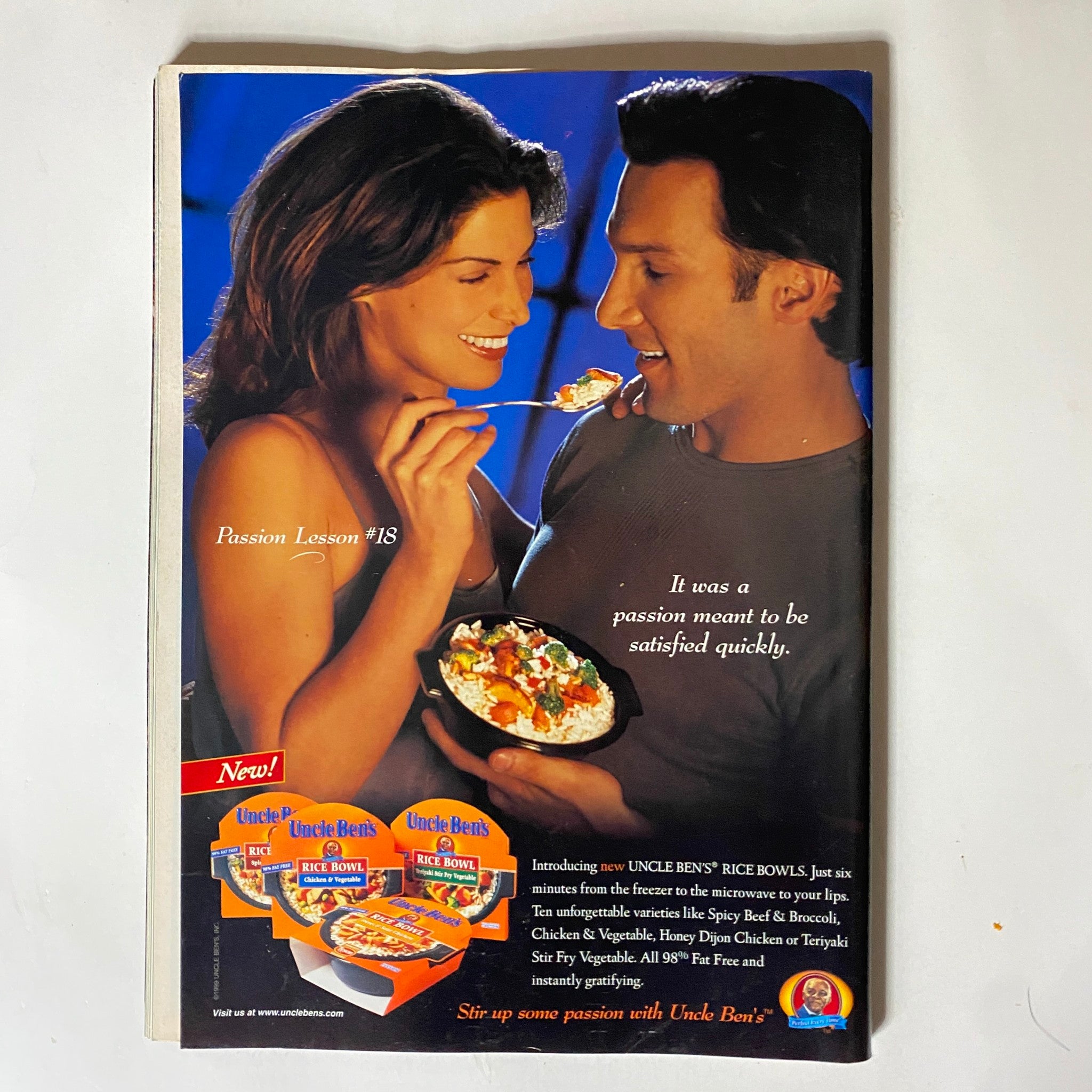 Back cover of Tennis Magazine July-August 1999 advertising Uncle Ben's Rice Bowls with a couple enjoying a meal together.