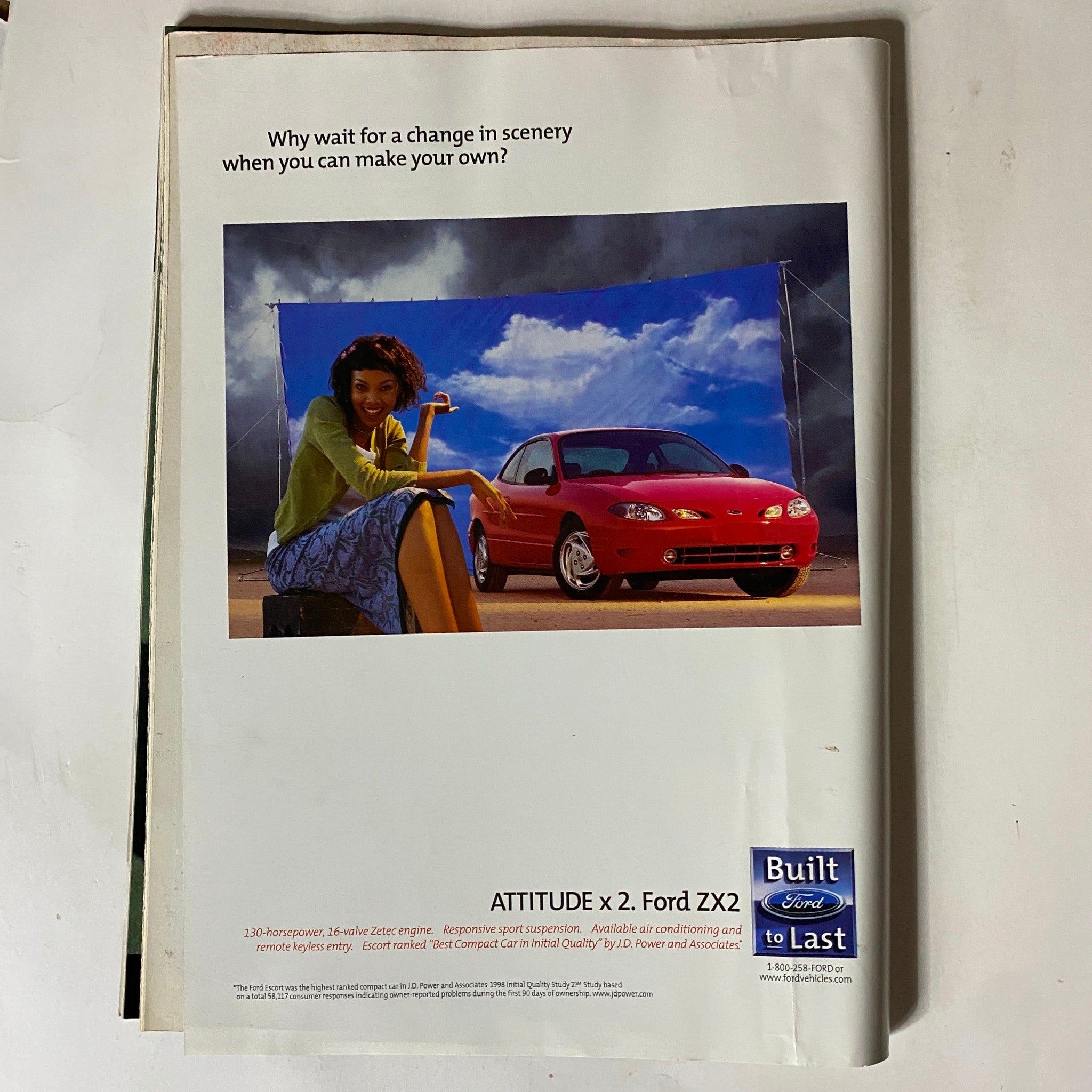 Back advertisement page of Tennis Magazine February 1999 featuring a promotional image for the Ford ZX2, along with an enticing message about creating your own scenery.