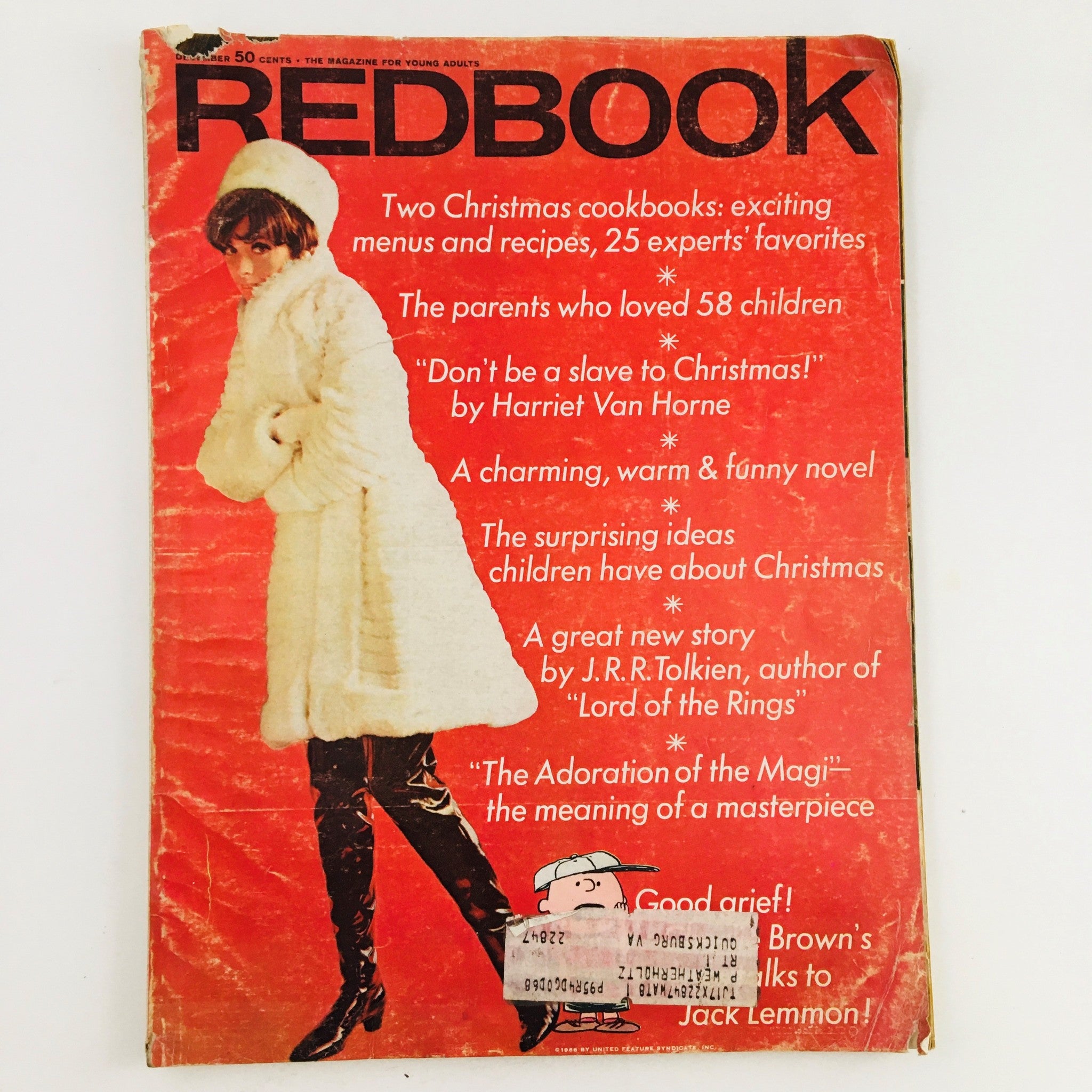 Cover of Redbook Magazine December 1967, featuring a fashionable model in winter attire and highlighting articles such as Christmas cookbooks and a story by J.R.R. Tolkien.