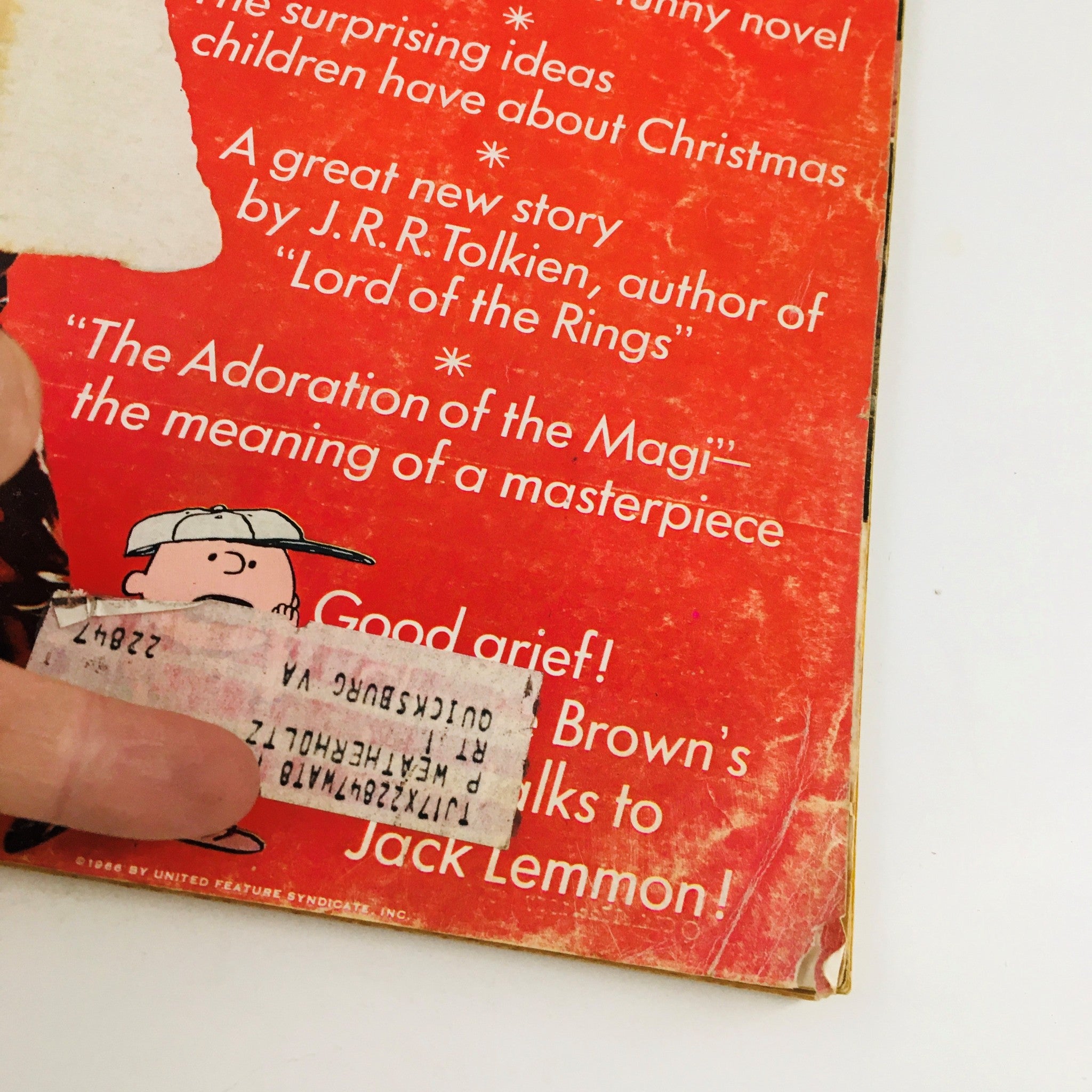 Detailed view of Redbook Magazine December 1967 cover, emphasizing the address label and wear, accentuating its vintage character.