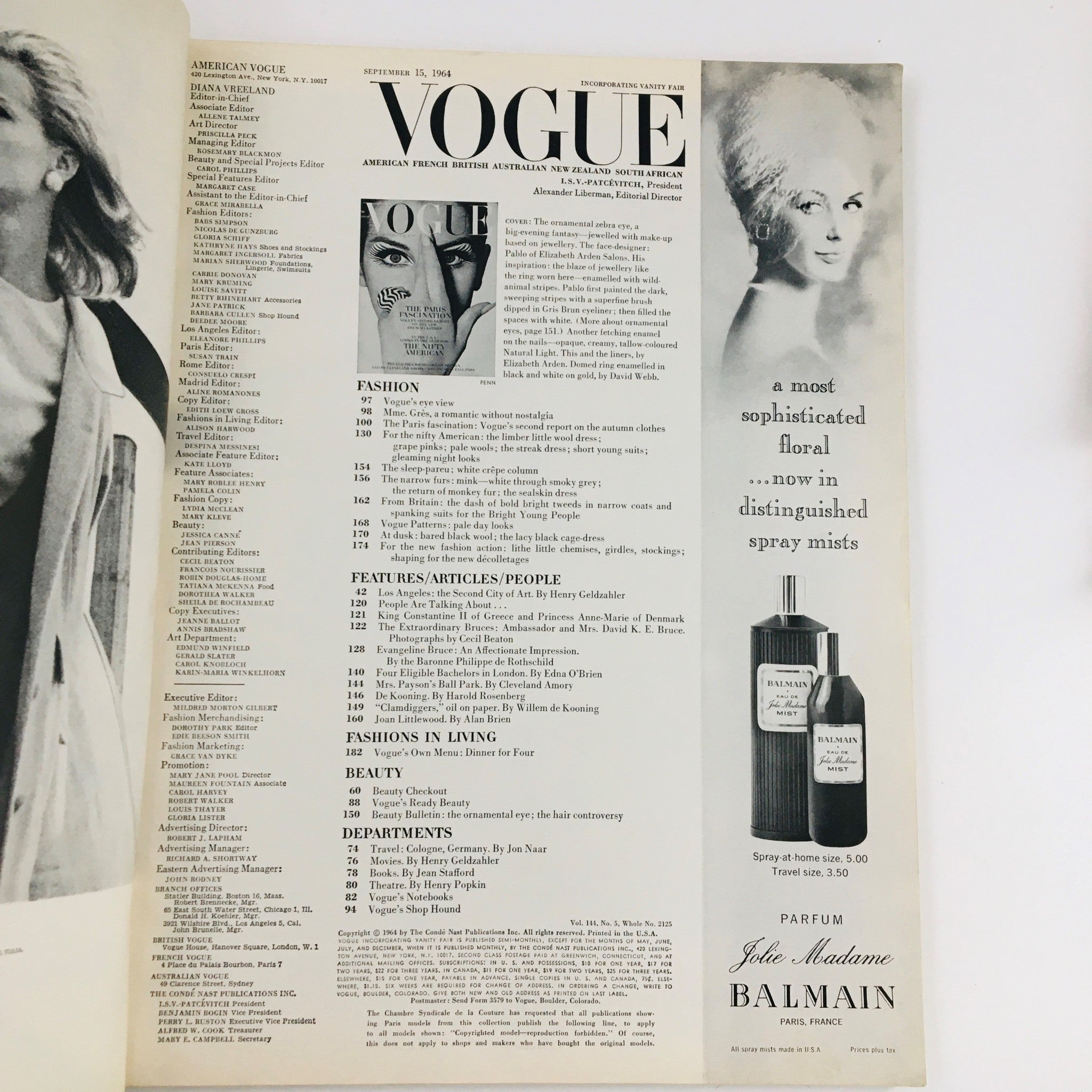 Interior page of Vogue Magazine September 15 1964 displaying the table of contents, highlighting various fashion and beauty articles along with a vintage perfume advertisement for Balmain, complementing the magazine's focus on 1960s style.