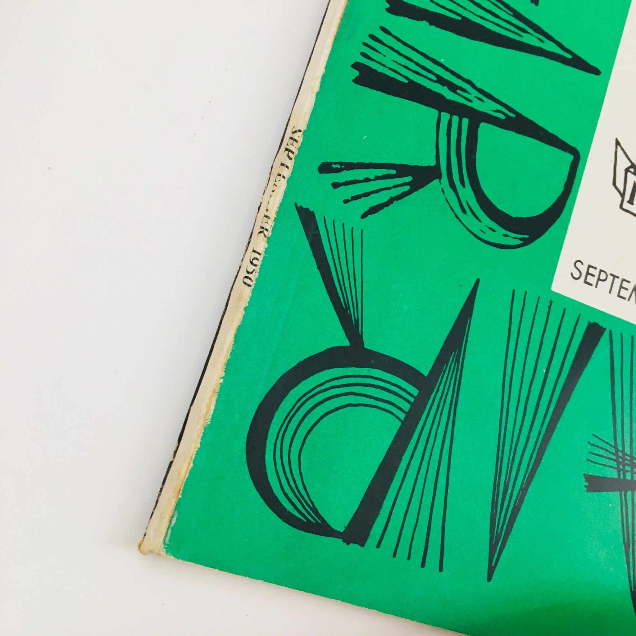 Cover detail of VTG Flair Magazine September 1950 Vol. 1 No. 8 showcasing a vibrant green design and unique typography.