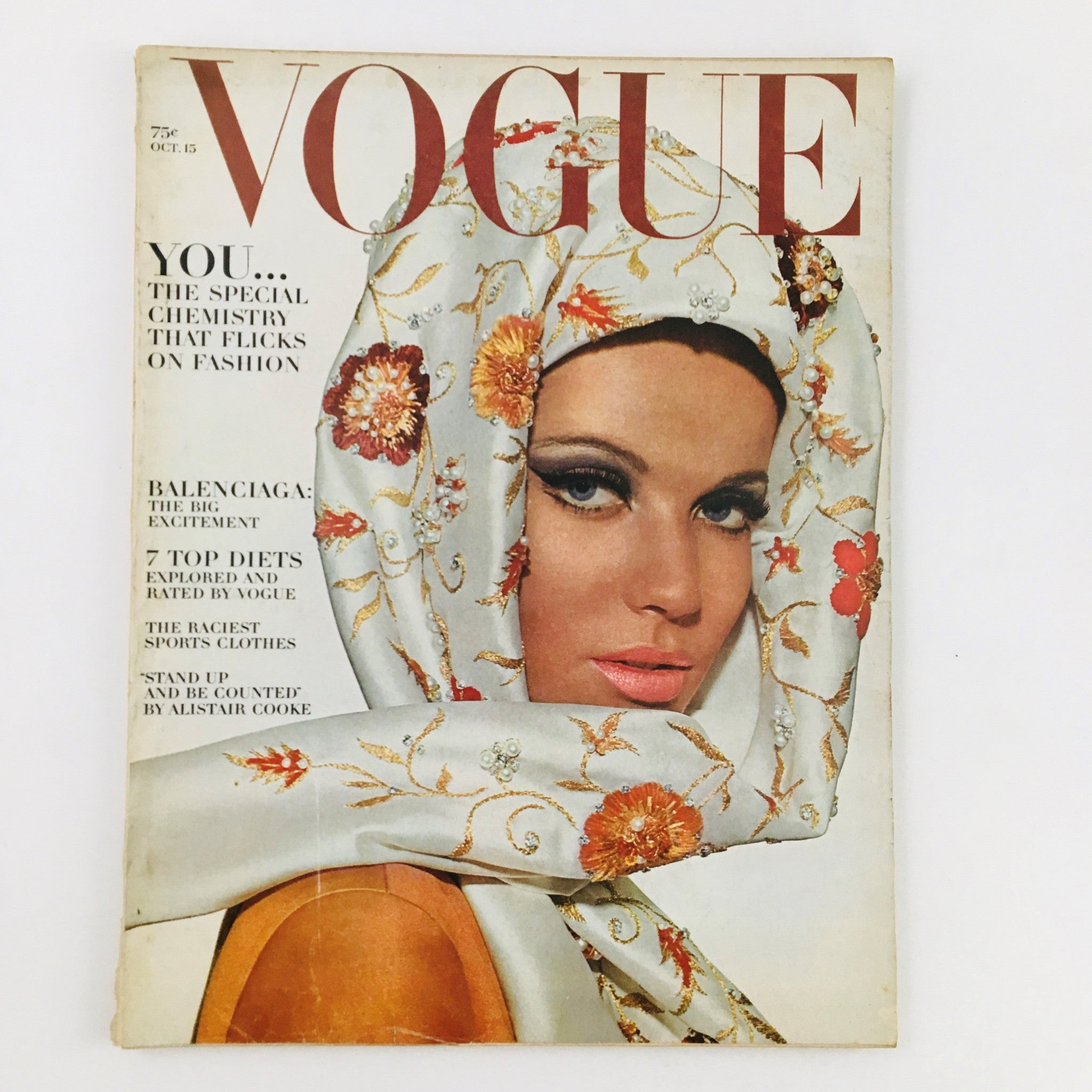 Cover of VTG Vogue Magazine from October 15, 1964 featuring a model with a decorative scarf, titled 'The Special Chemistry on Fashion'.