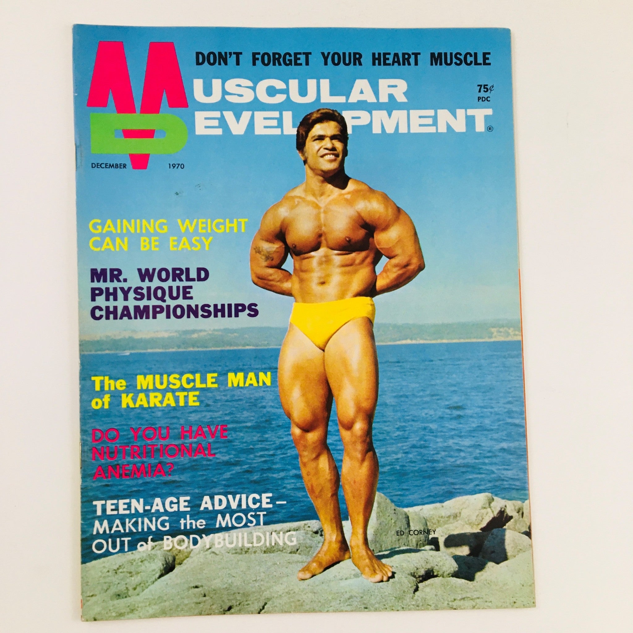 Muscular Development Magazine December 1970 featuring Ed Corney on the cover, showcasing bodybuilding and martial arts themes with a vibrant layout.