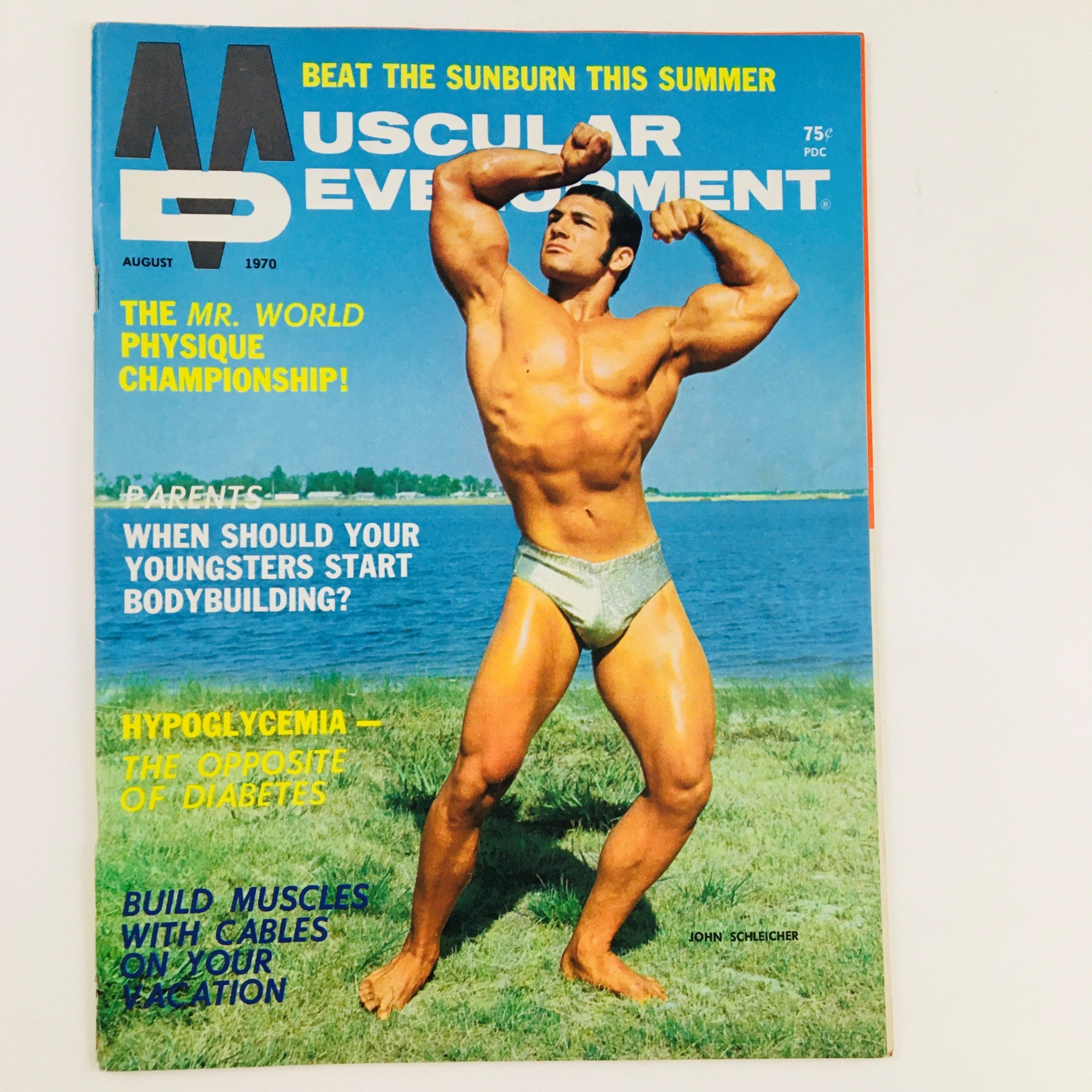 Cover of Muscular Development Magazine August 1970, featuring John Schleicher showcasing a muscular pose. The cover includes text about the Mr. World Physique Championship and various bodybuilding tips.