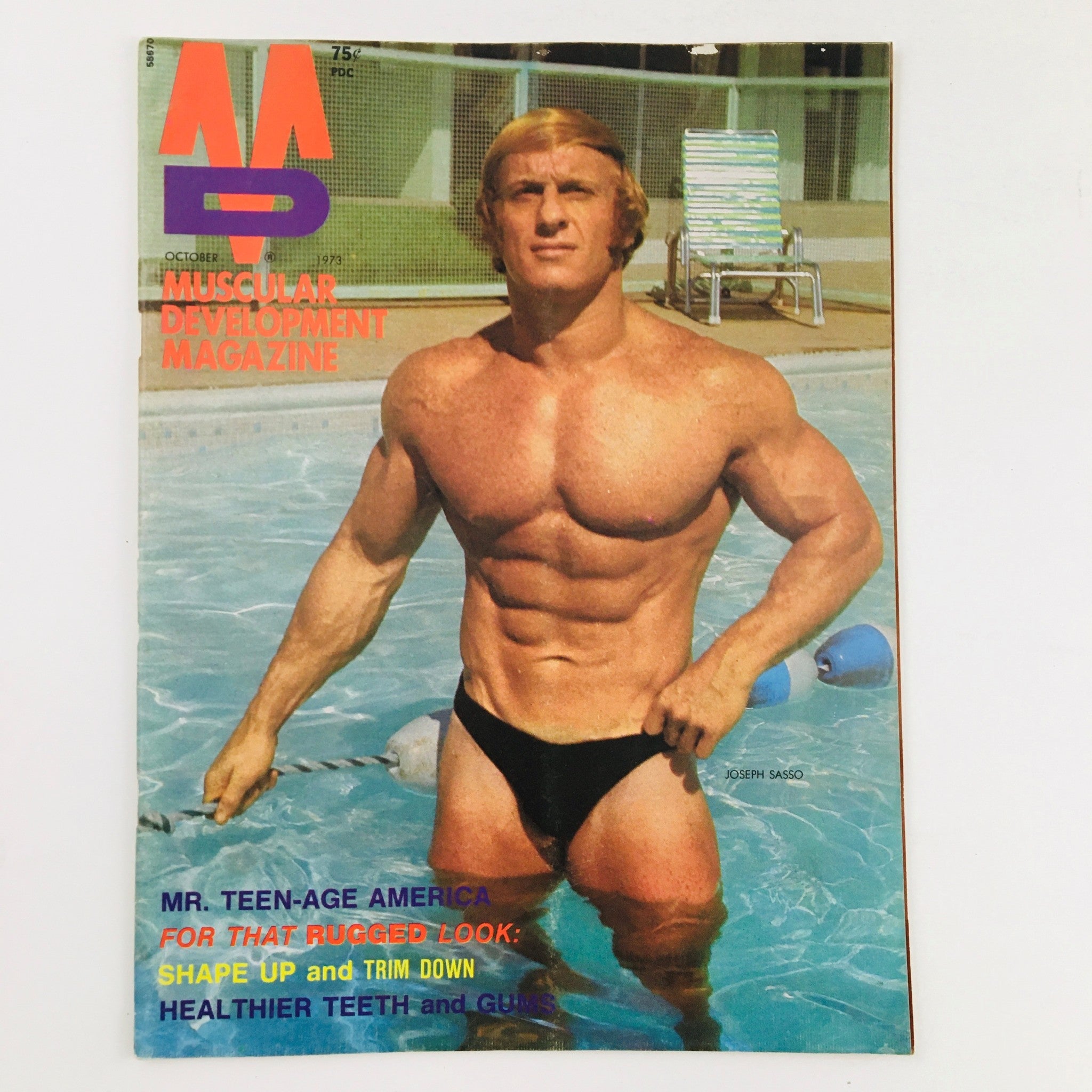 Cover of Muscular Development Magazine October 1973 featuring bodybuilder Joseph Sasso, showcasing bodybuilding culture of the 1970s.