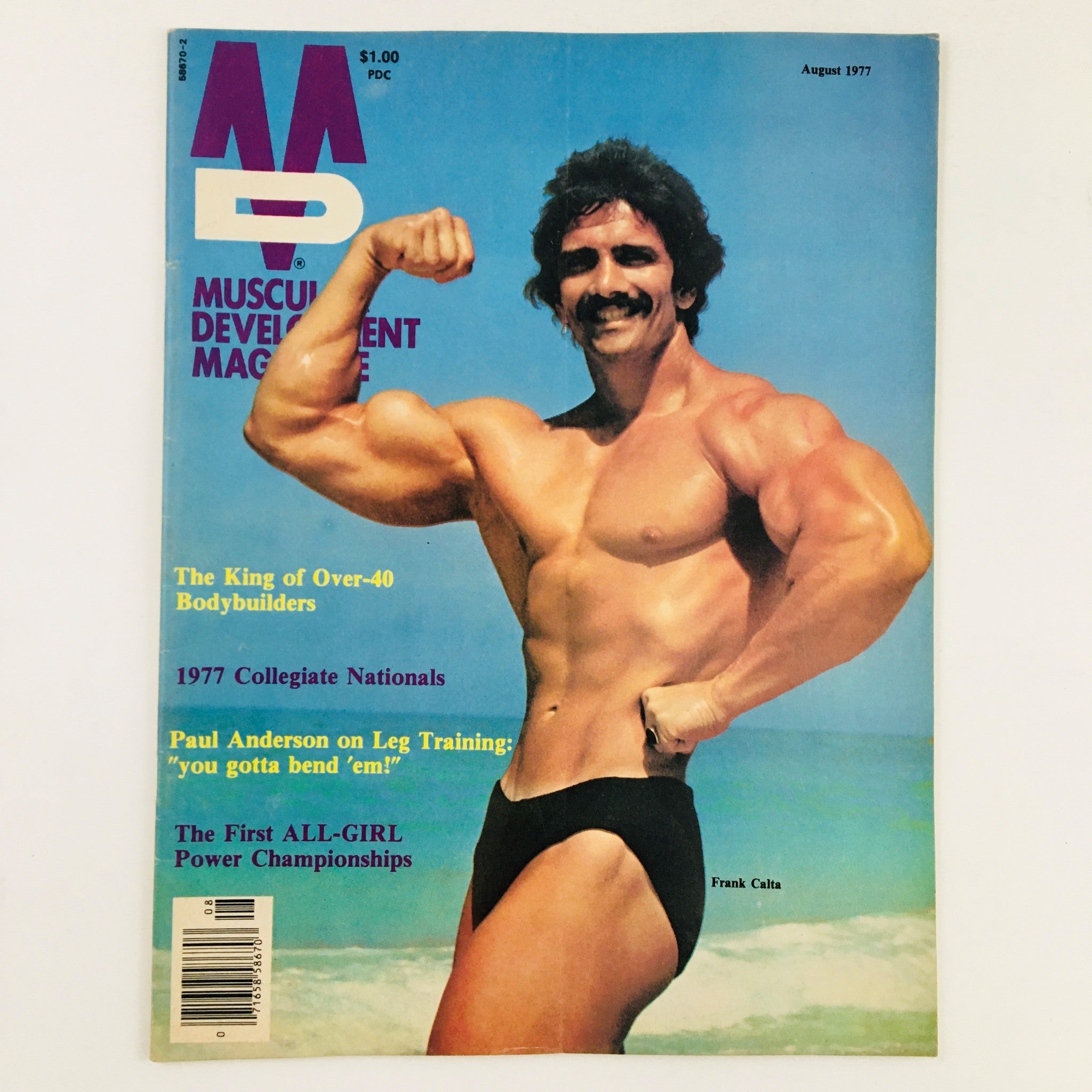 Cover of Muscular Development Magazine August 1977 featuring bodybuilder Frank Calta flexing his muscles against a beach backdrop, highlighting the fitness culture of the late 1970s.