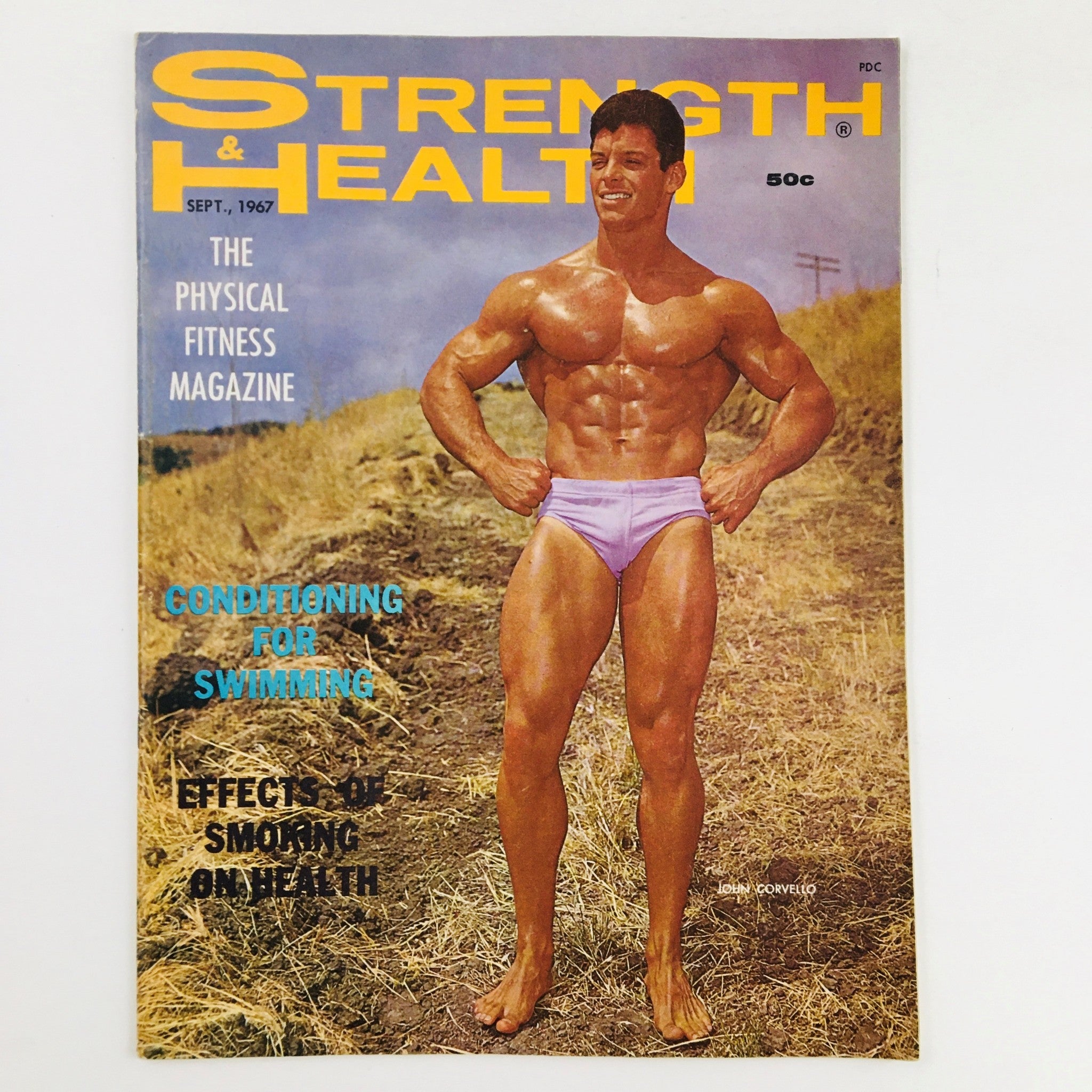 Cover of Strength & Health Magazine September 1967 featuring John Corvello, a prominent bodybuilder, showcasing a muscular physique in a vintage setting, emphasizing physical fitness and bodybuilding culture.