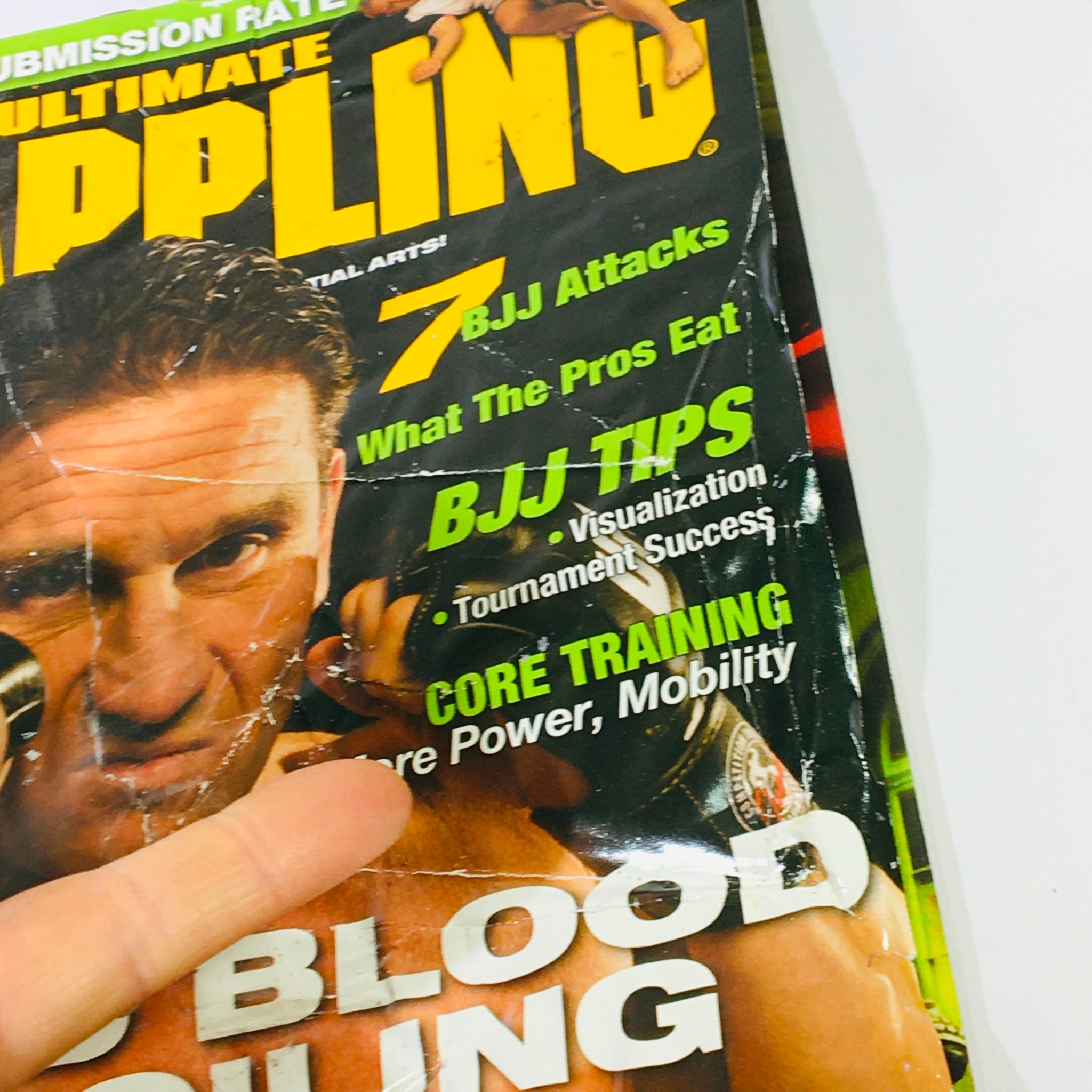 Ultimate Grappling MMA Magazine August 2006 - Ken Shamrock and Tito Ortiz