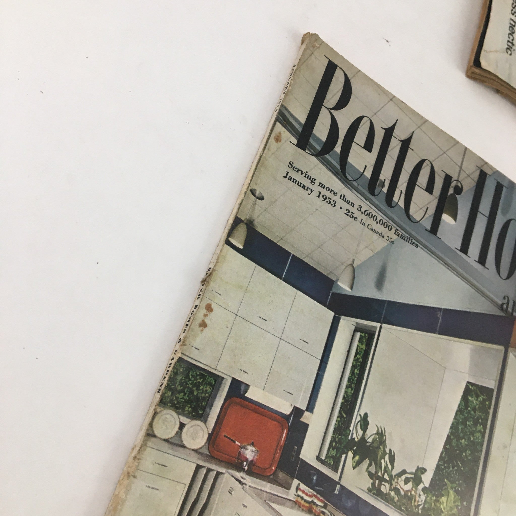 Side view of Better Homes & Gardens January 1953 magazine highlighting vintage kitchen aesthetics.
