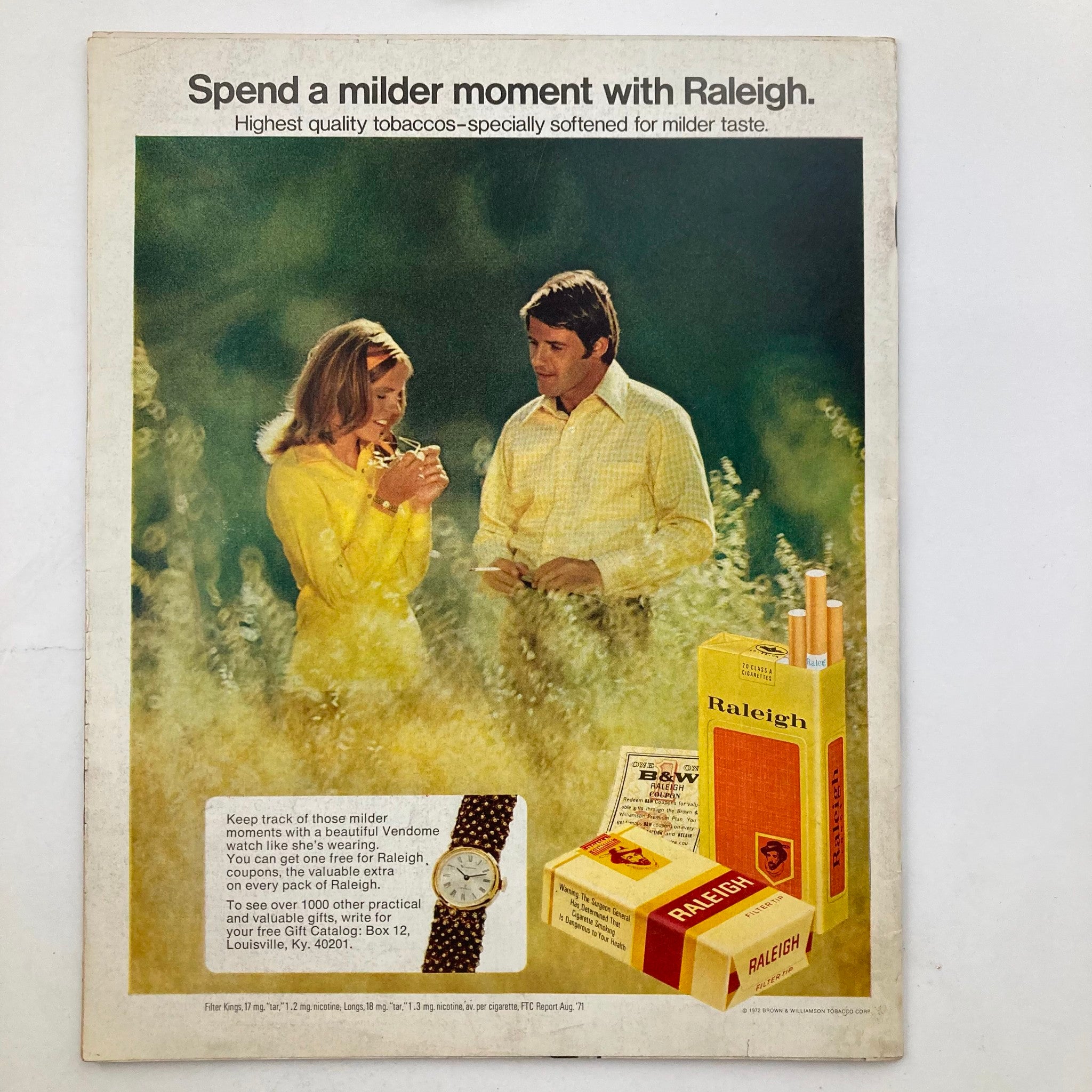 Back advertisement page of VTG Life Magazine March 3 1972 for Raleigh cigarettes featuring a couple in a natural setting.