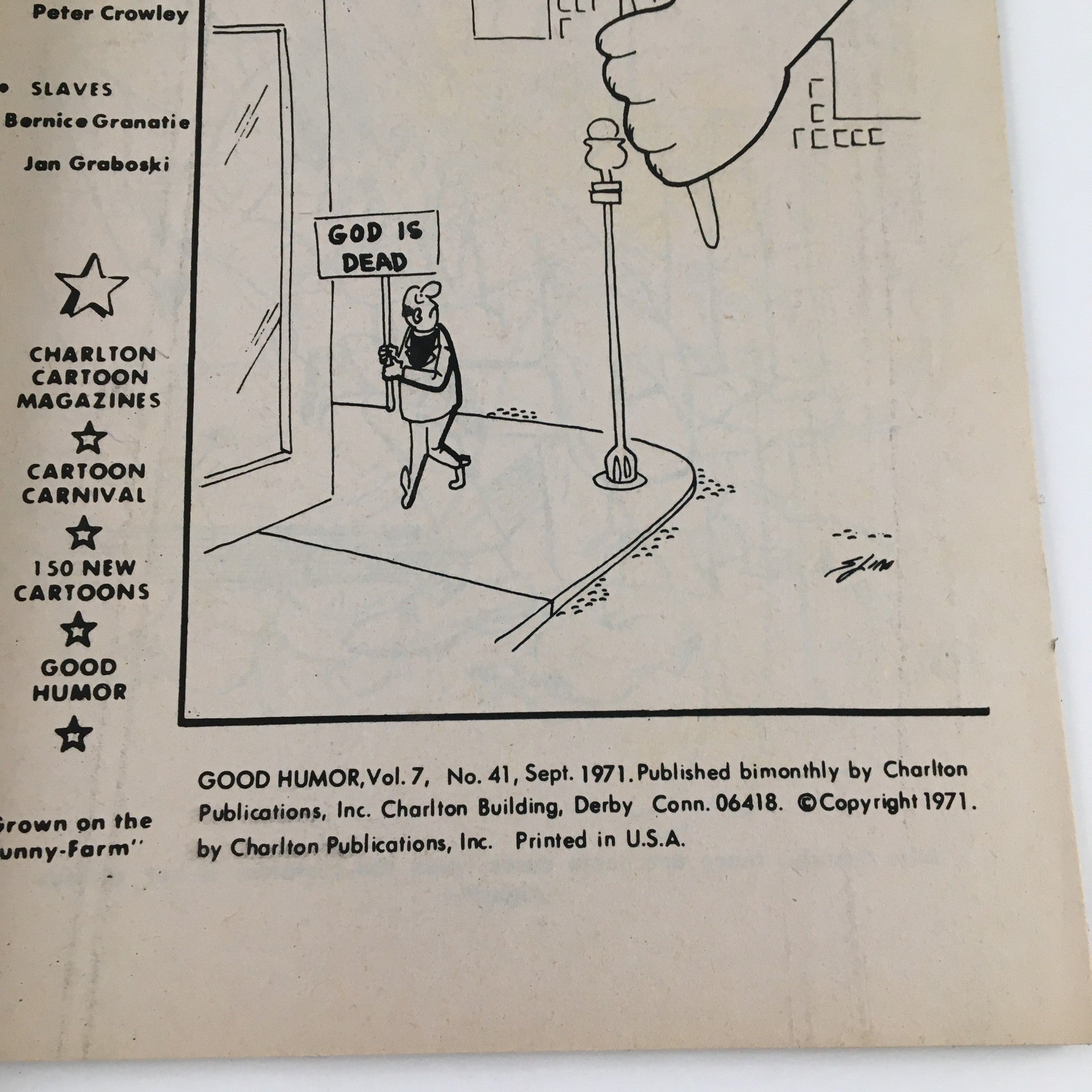 Interior page of Good Humor September 1971 No. 41 magazine showcasing a cartoon with a figure holding a sign stating 'God is dead', reflecting 1970s humor.