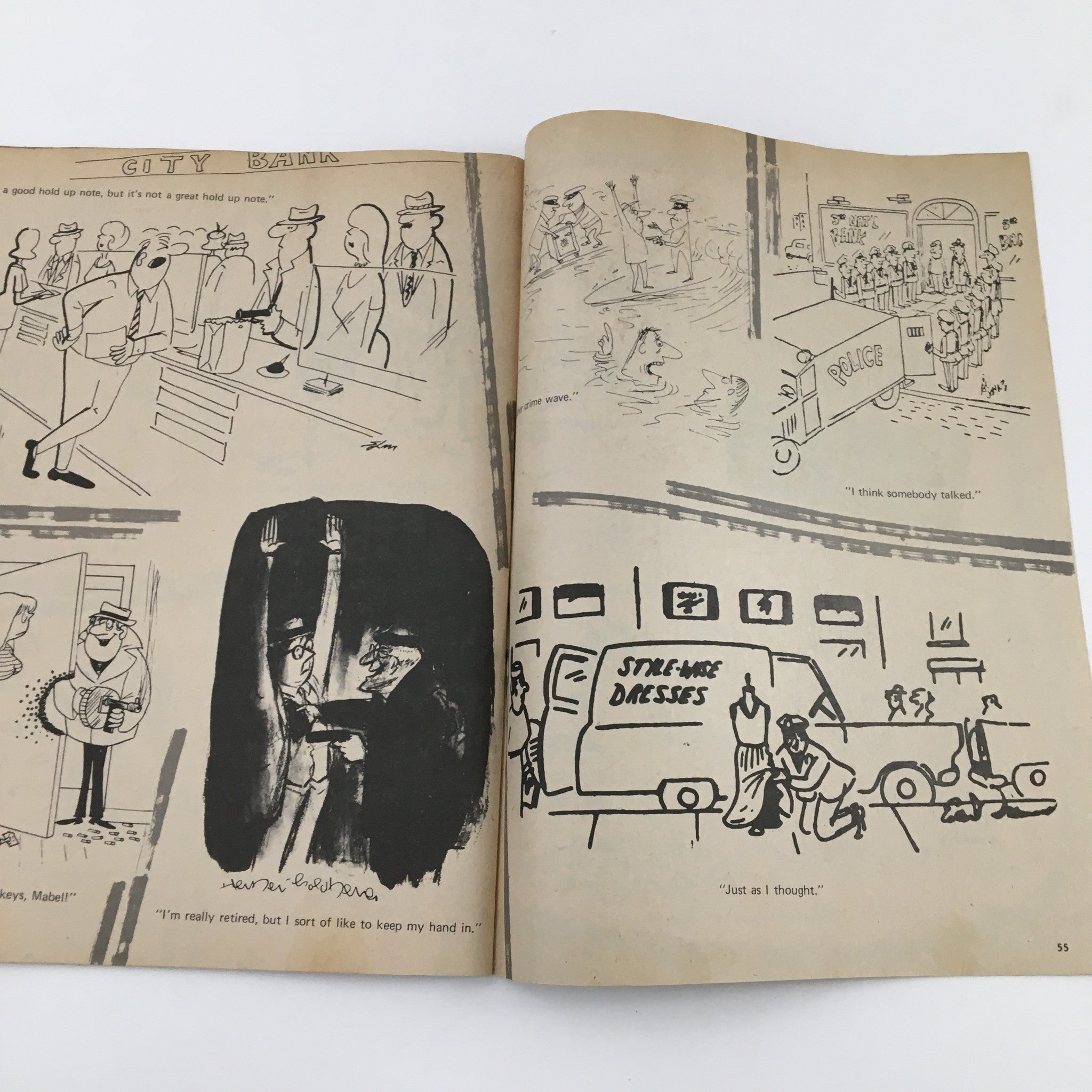 Vintage Cartoon Laughs January 1971 Vol. 10 No. 1 displaying pages of cartoons depicting humorous situations in everyday life, including characters in a bank and playful scenes.