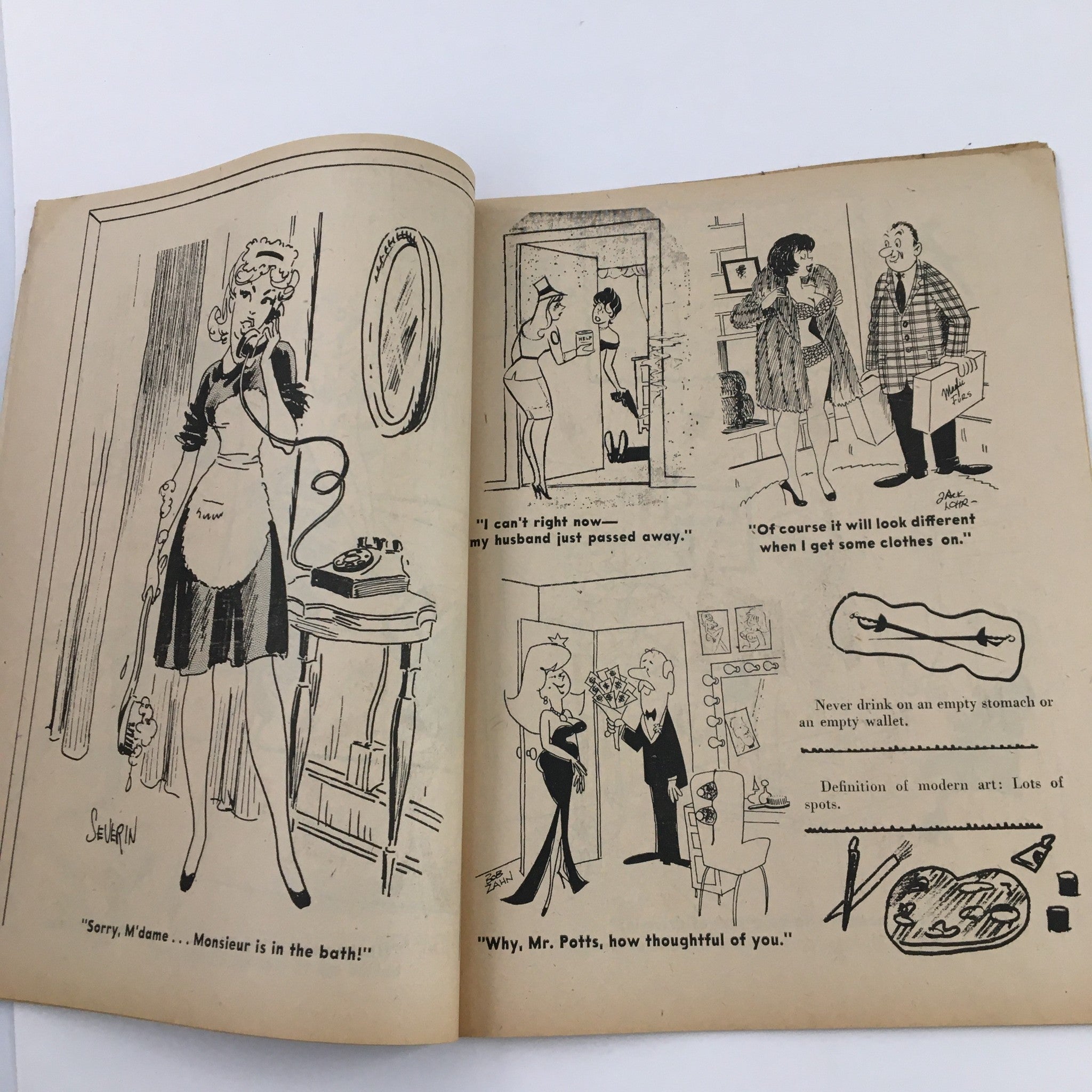 An interior spread from 'French Cartoons and Cuties' August 1964 Vol. 1 No. 37 displaying humorous comic strips with cultural insights.