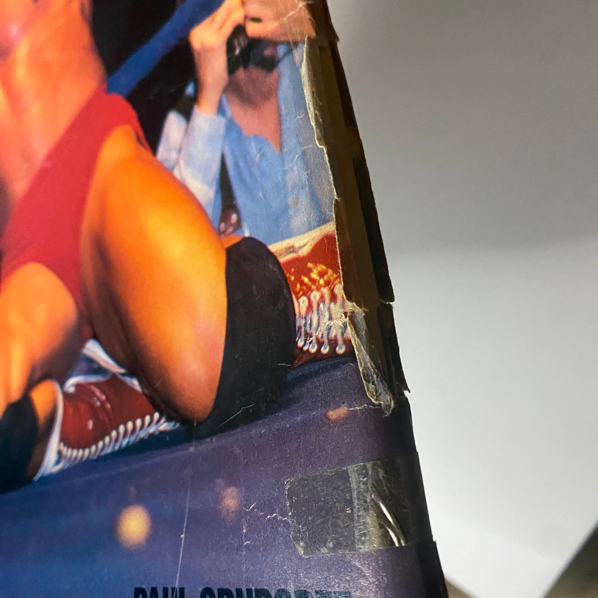 Close-up view of the damaged cover of the June 1985 Wrestling Scene Magazine, prominently displaying Paul Orndorff in the wrestling ring.