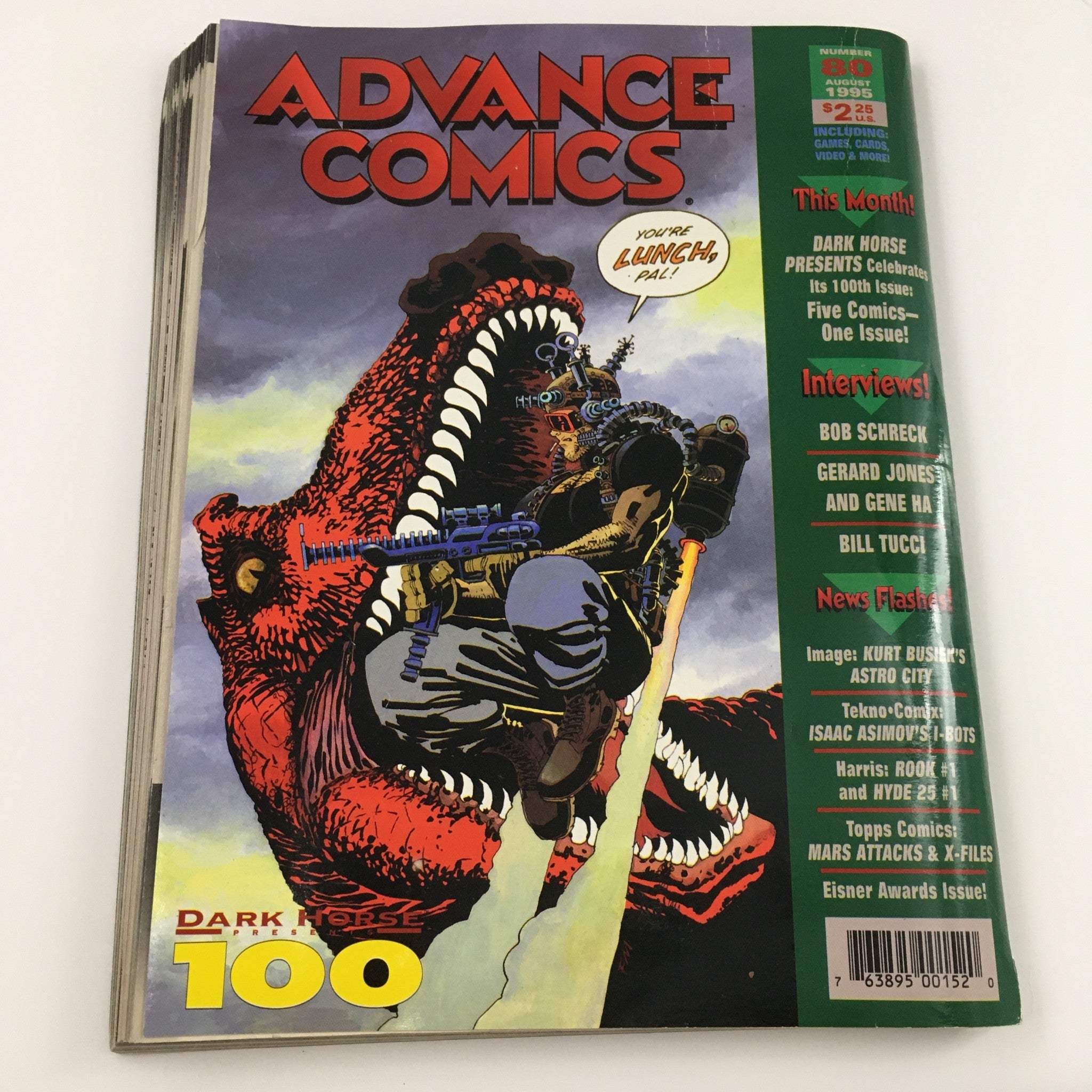 Cover of Advance Comics August 1996 No. 100 featuring a dynamic character and a dinosaur, highlighting the 100th issue celebration of Dark Horse Comics.