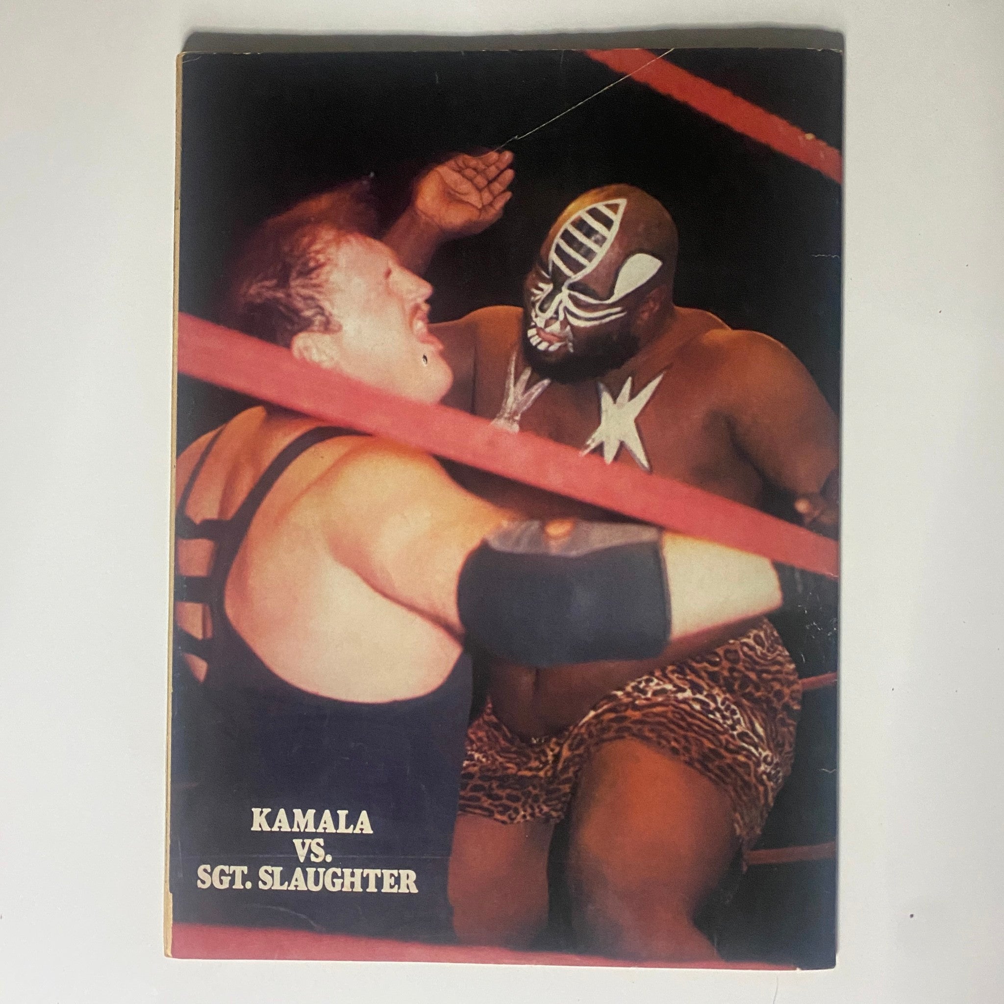 Back cover of the Vintage Wrestling World Magazine December 1985 highlighting the match between Kamala and Sgt. Slaughter.