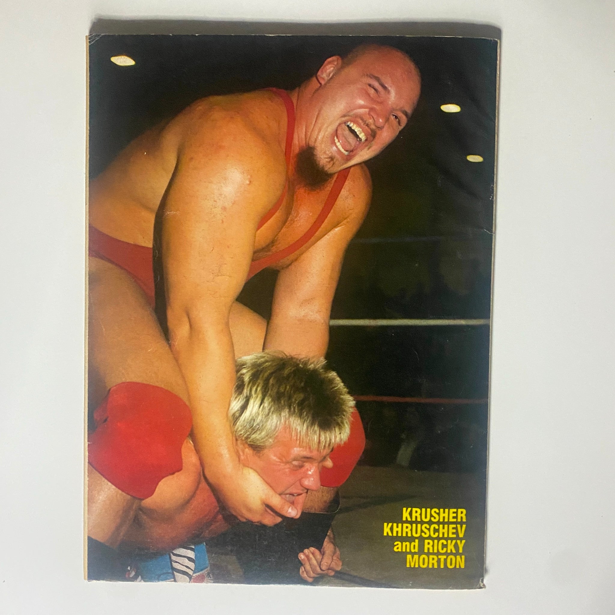 Back cover of Wrestling All Stars Heroes & Villains April 1986 Vintage Magazine displaying Krusher Khruschev and Ricky Morton in an action shot.
