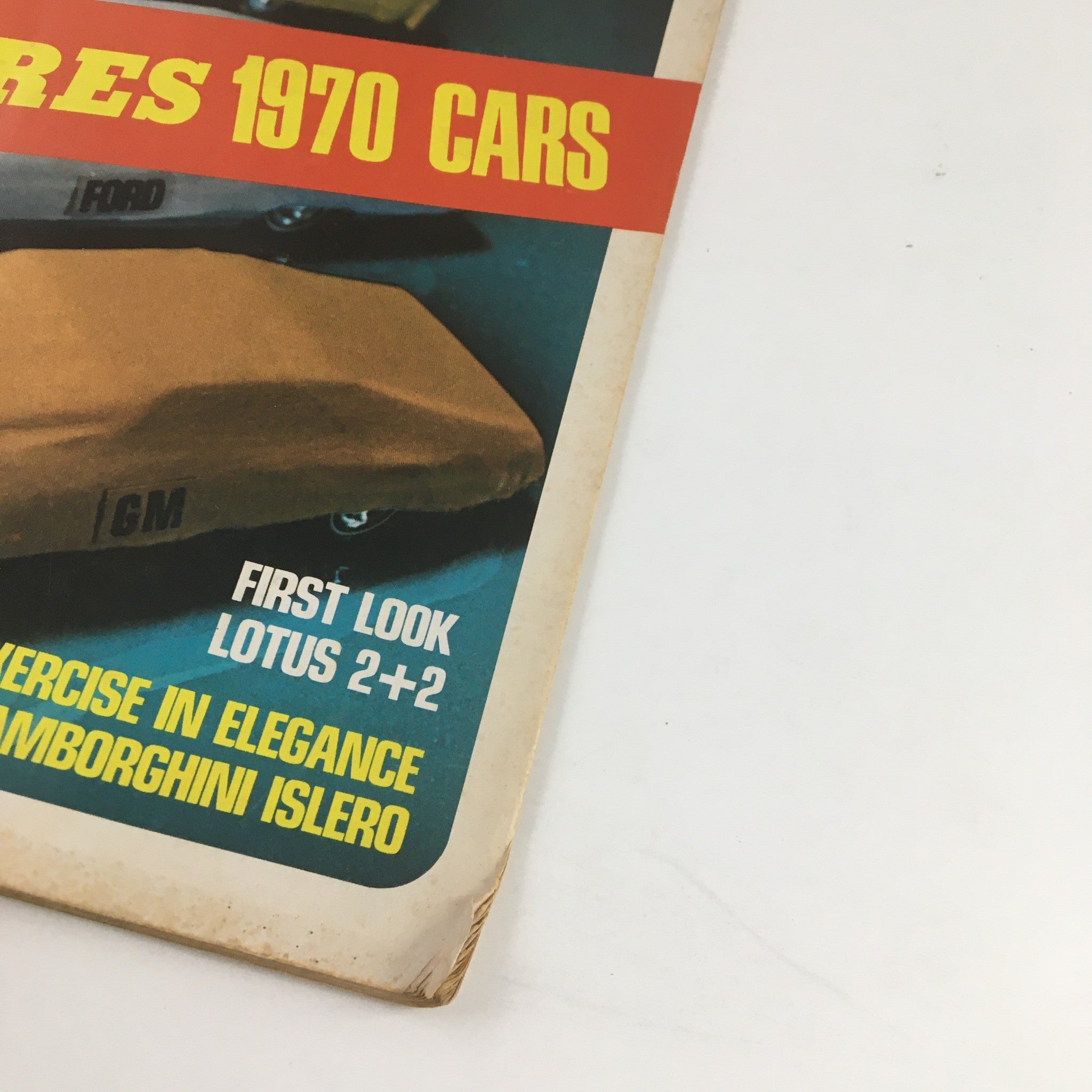 Close-up of Road Test Magazine August 1969 cover highlighting Exercise in Elegance Lamborghini Islero and various car models.