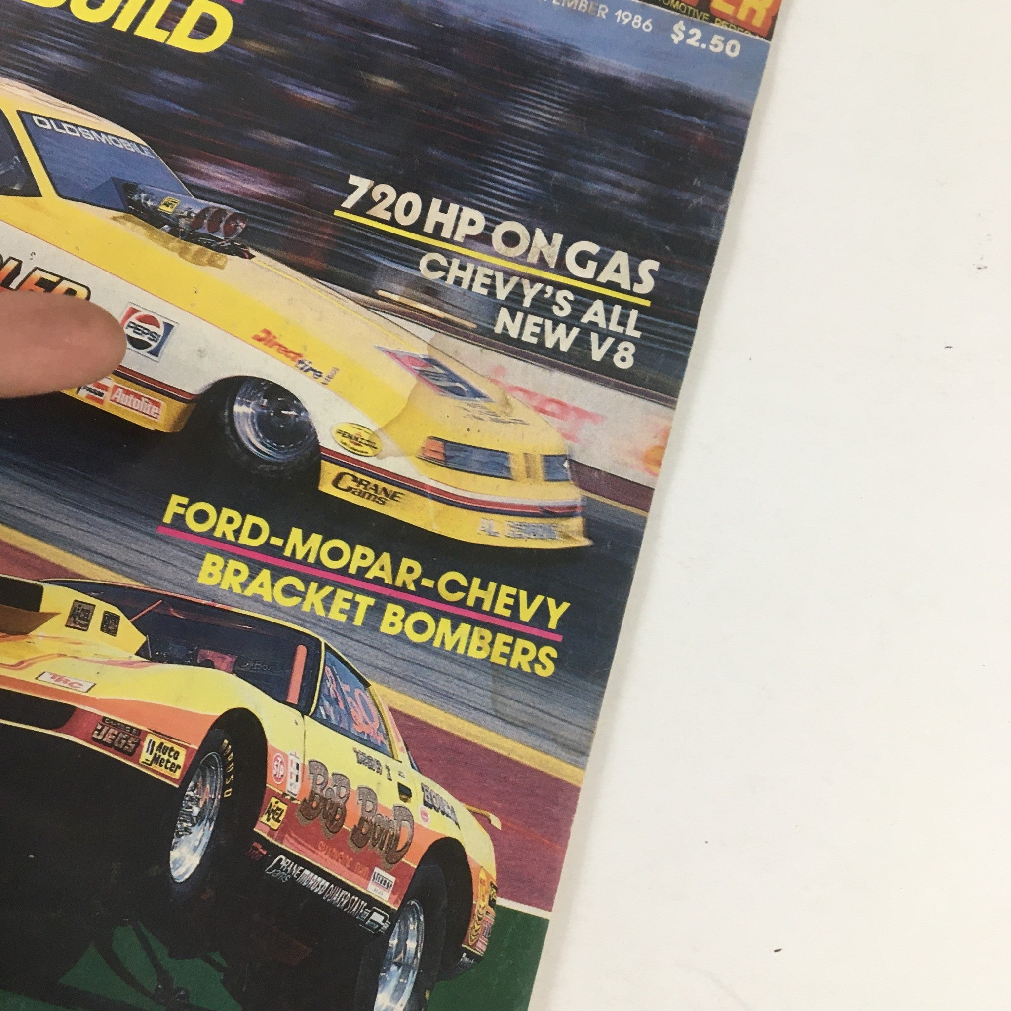 Close-up of the Super Stock Magazine November 1986 cover, emphasizing details about 720 horsepower Chevy V8 engine and Ford-Mopar-Chevy bracket bombers, highlighting Big Daddy Don Garlits.