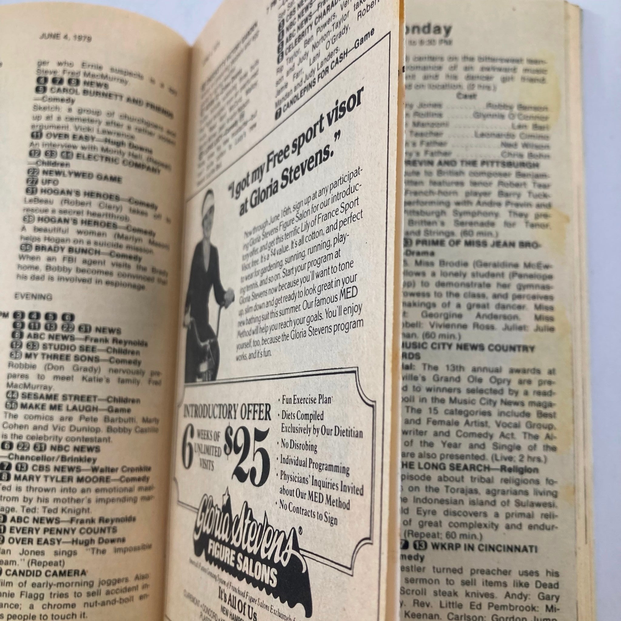 TV Guide Magazine June 2 1979 #1366 featuring an advertisement for Gloria Stevens Figure Salons, showcasing beauty products and services, opened to the page of evening TV listings.