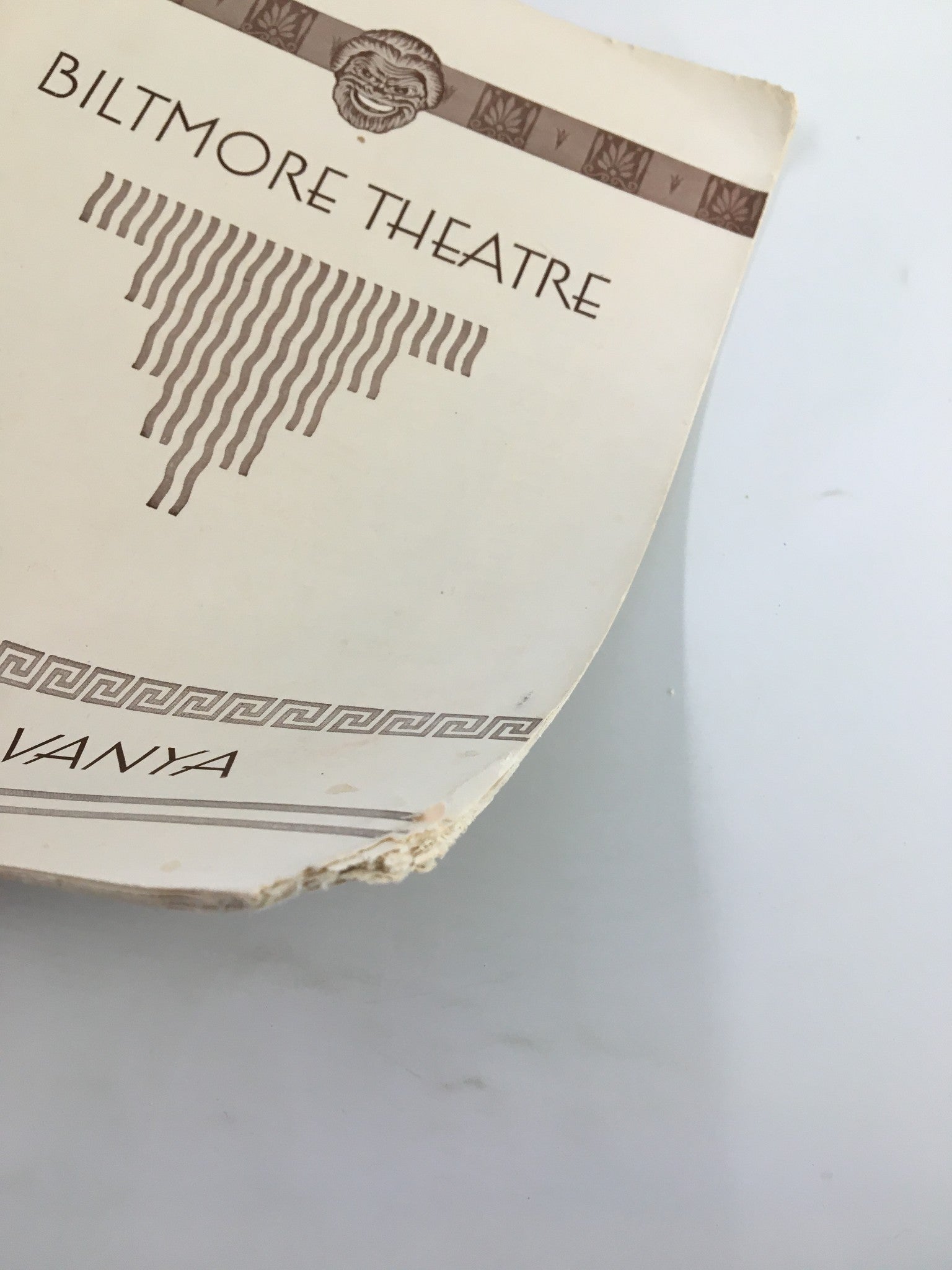 Angle view of the 1930 Biltmore Theatre magazine for 'Uncle Vanya,' focusing on the worn edges and cover details.