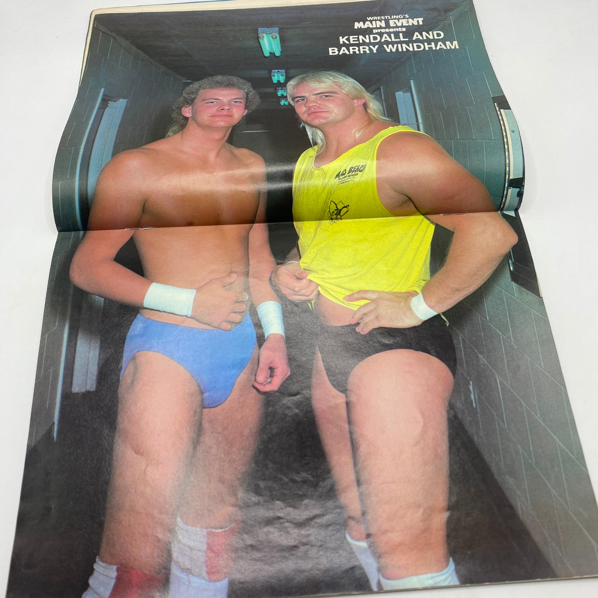 Double-page spread from VTG Wrestling's Main Event Magazine April 1986 featuring Kendall Windham and Barry Windham, capturing a moment of wrestling history.