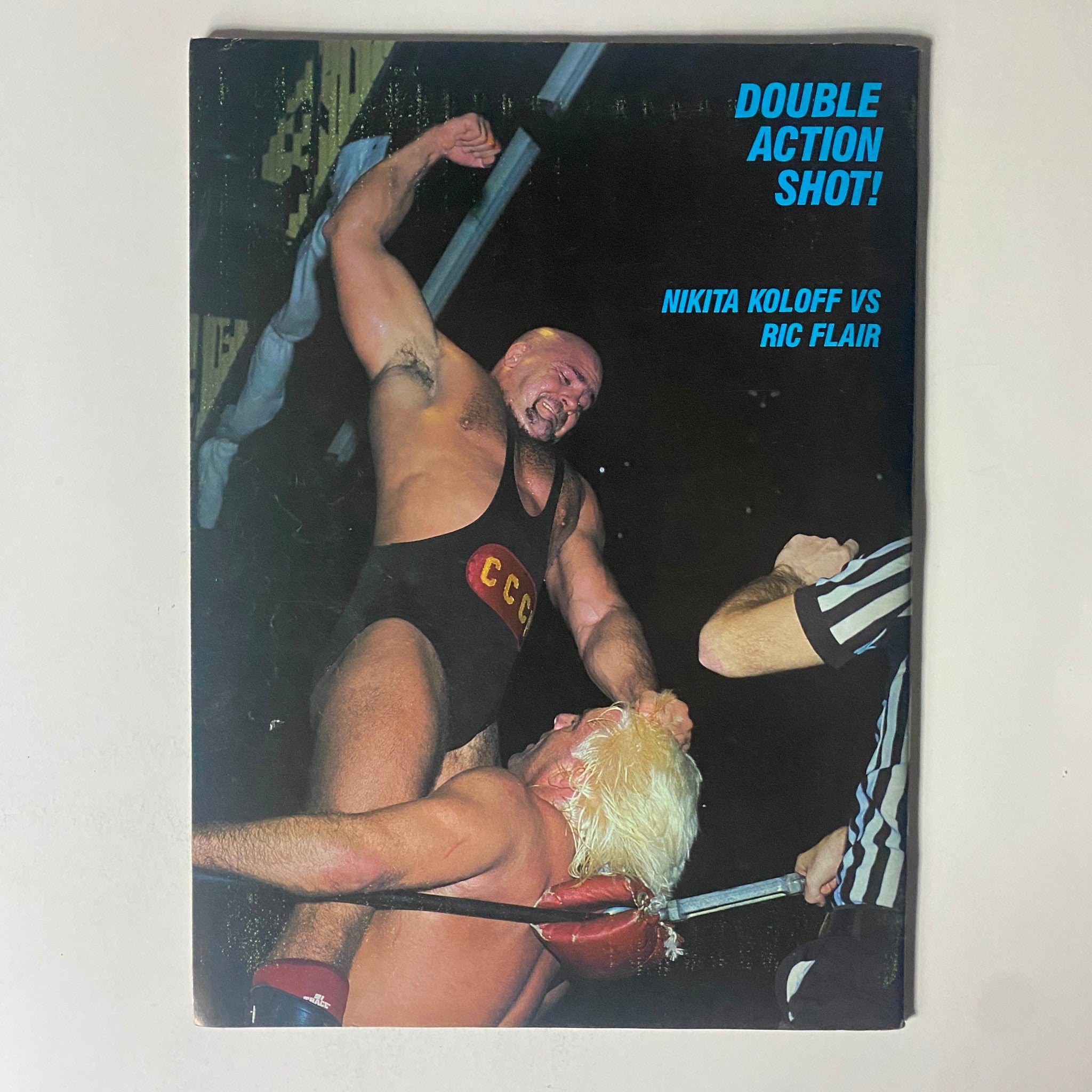 Back cover of the VTG Double Action Wrestling Magazine July 1987 highlighting a classic match between Nikita Koloff and Ric Flair, an important feature for wrestling memorabilia enthusiasts.