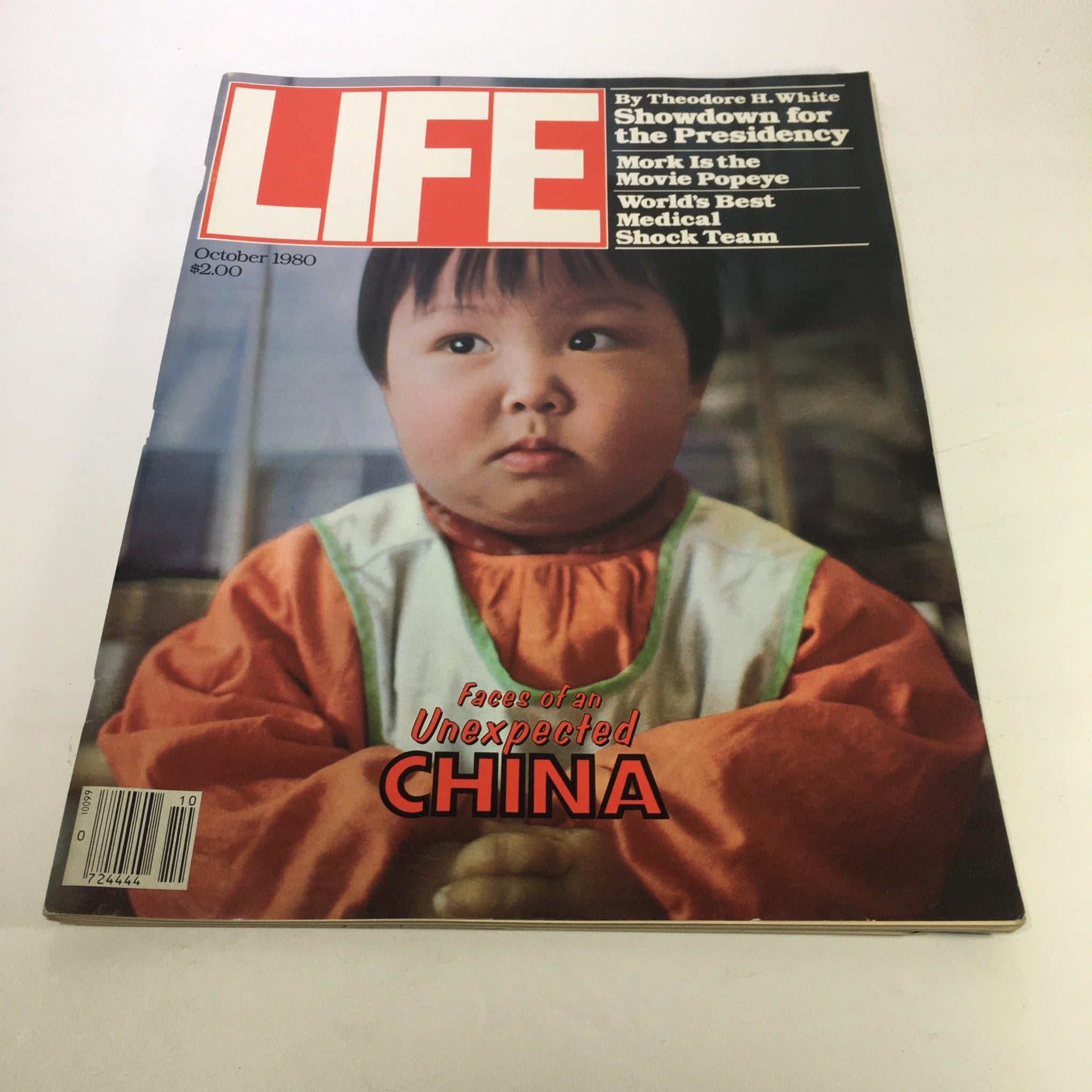 Cover page of Life Magazine from October 1980, titled 'Faces Of An Unexpected China', featuring a young child in traditional clothing and showcasing vivid photography and cultural insights from China.