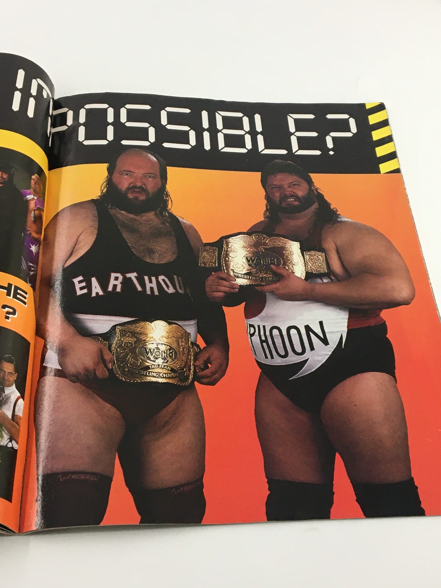 VTG WWF Magazine October 1992 featuring wrestlers Earthquake and Typhoon holding championship belts, showcasing a vibrant wrestling era.