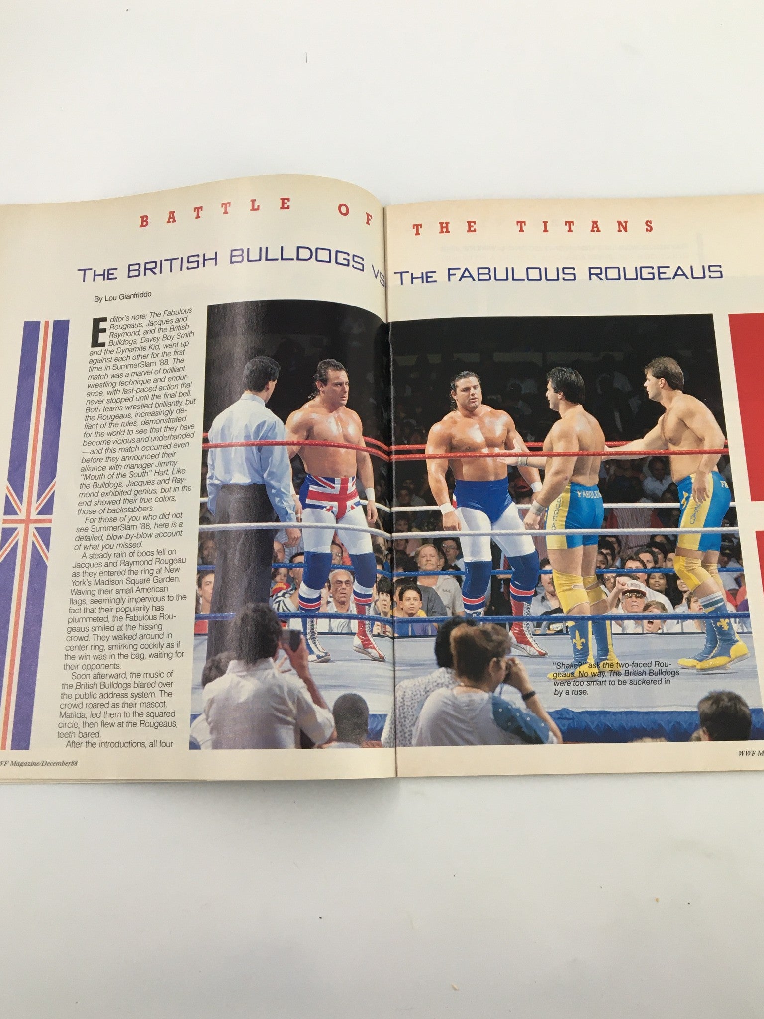 Match preview from VTG WWF Magazine December 1988 highlighting the showdown between The British Bulldogs and The Fabulous Rougeaus in the wrestling ring.