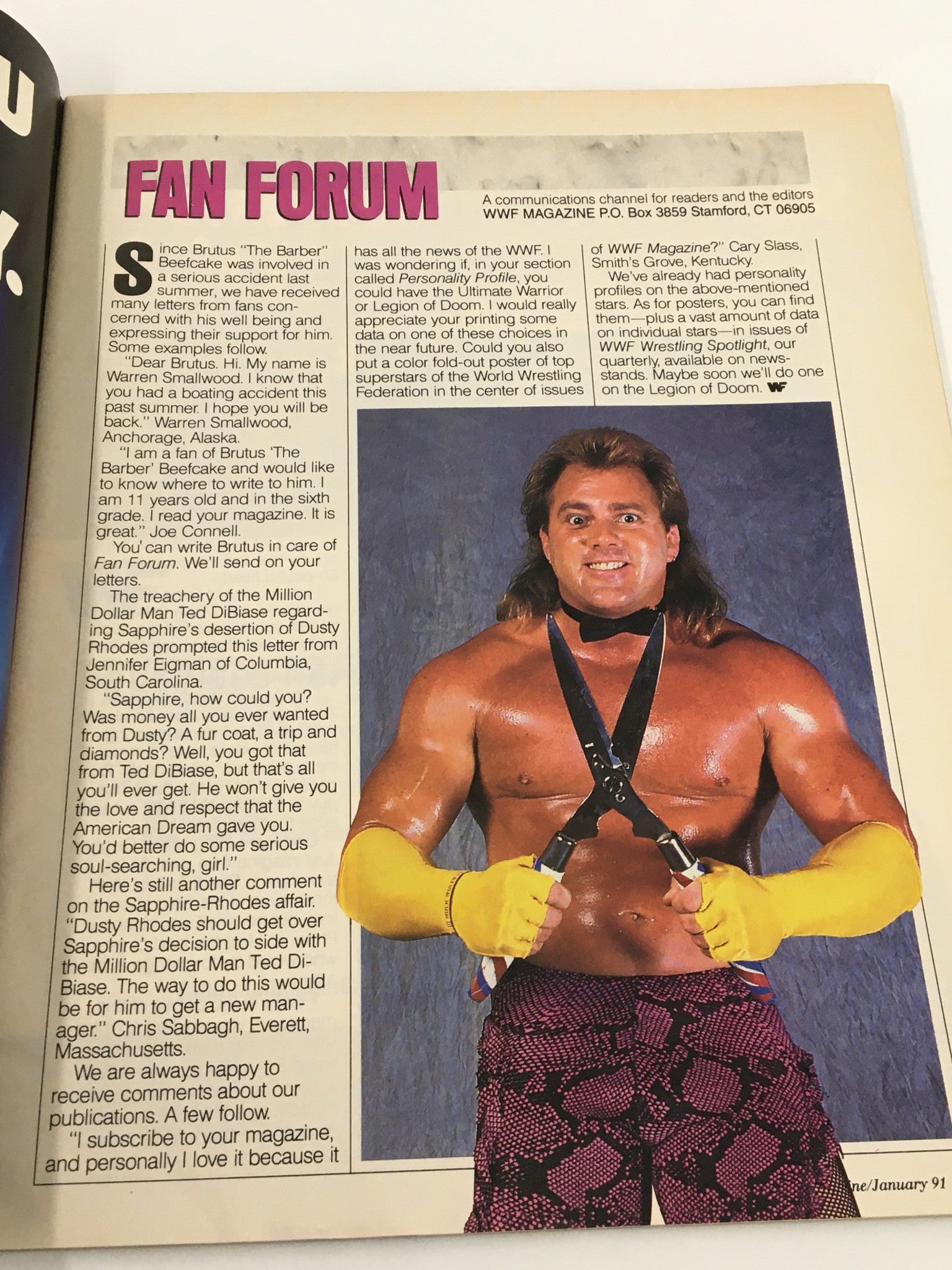 WWF Magazine January 1991 - Fan Forum section featuring a male wrestler in a colorful outfit, showcasing the magazine's engagement with fans.