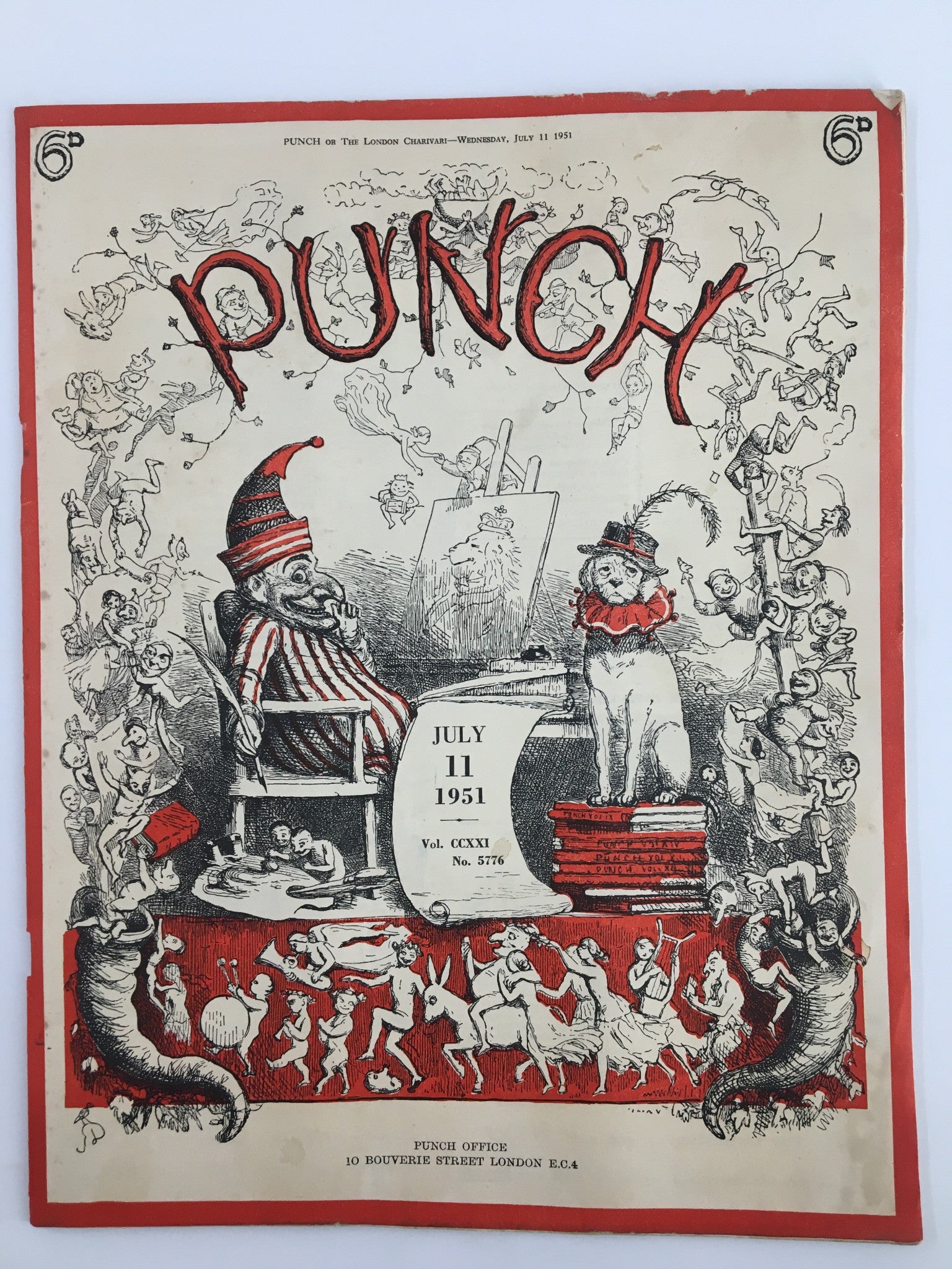 Cover of the VTG Punch magazine from July 11, 1951, featuring whimsical illustrations, a clown, a cat, and various humorous figures. This WWII Cartoon & Humour Magazine captures the essence of post-war Britain with its witty artwork and social commentary.