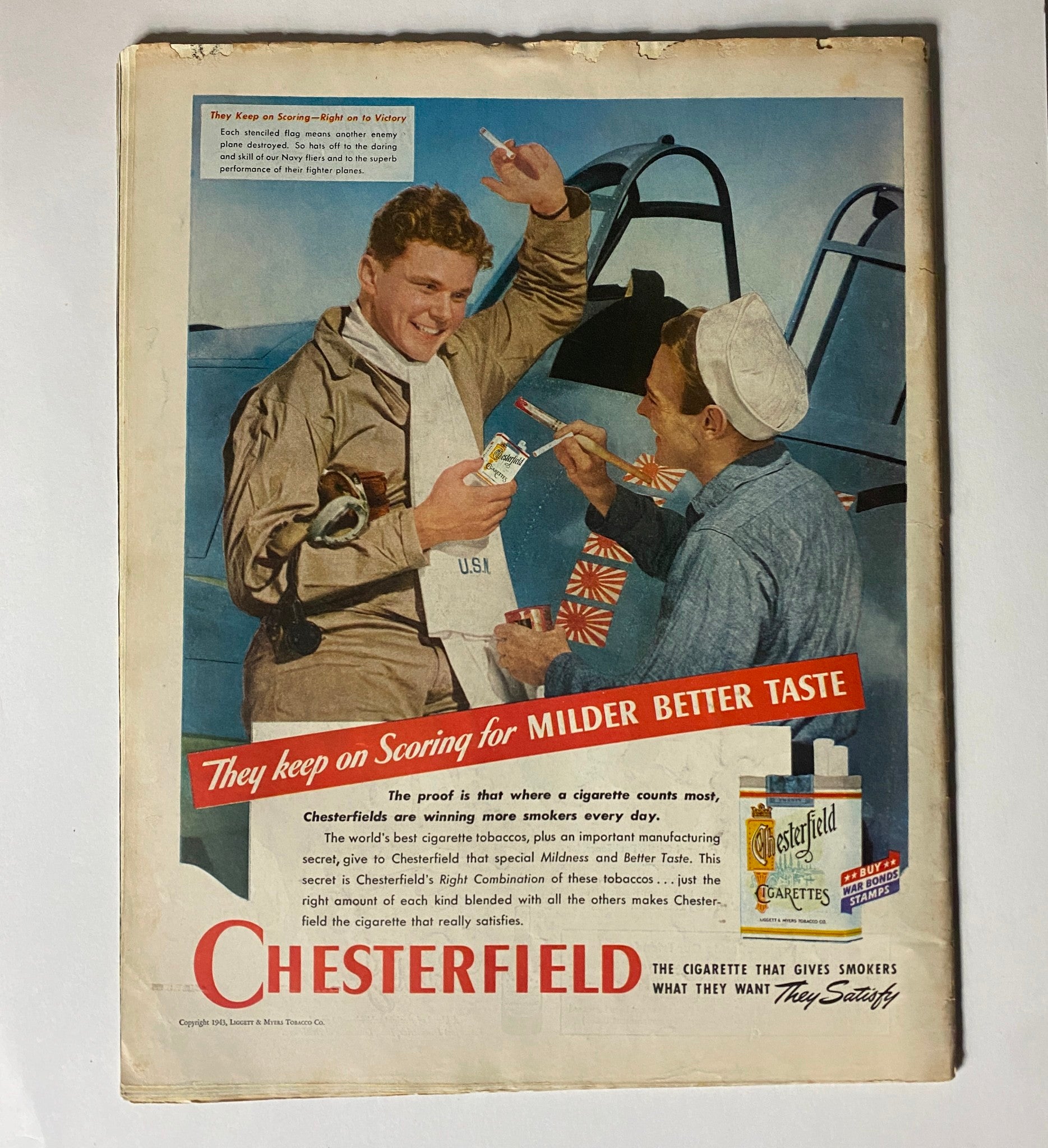Advertisement from VTG Collier's Magazine July 17, 1943 for Chesterfield cigarettes, showcasing Navy soldiers enjoying their product, with the slogan 'They keep on Scoring for MILDER BETTER TASTE'.