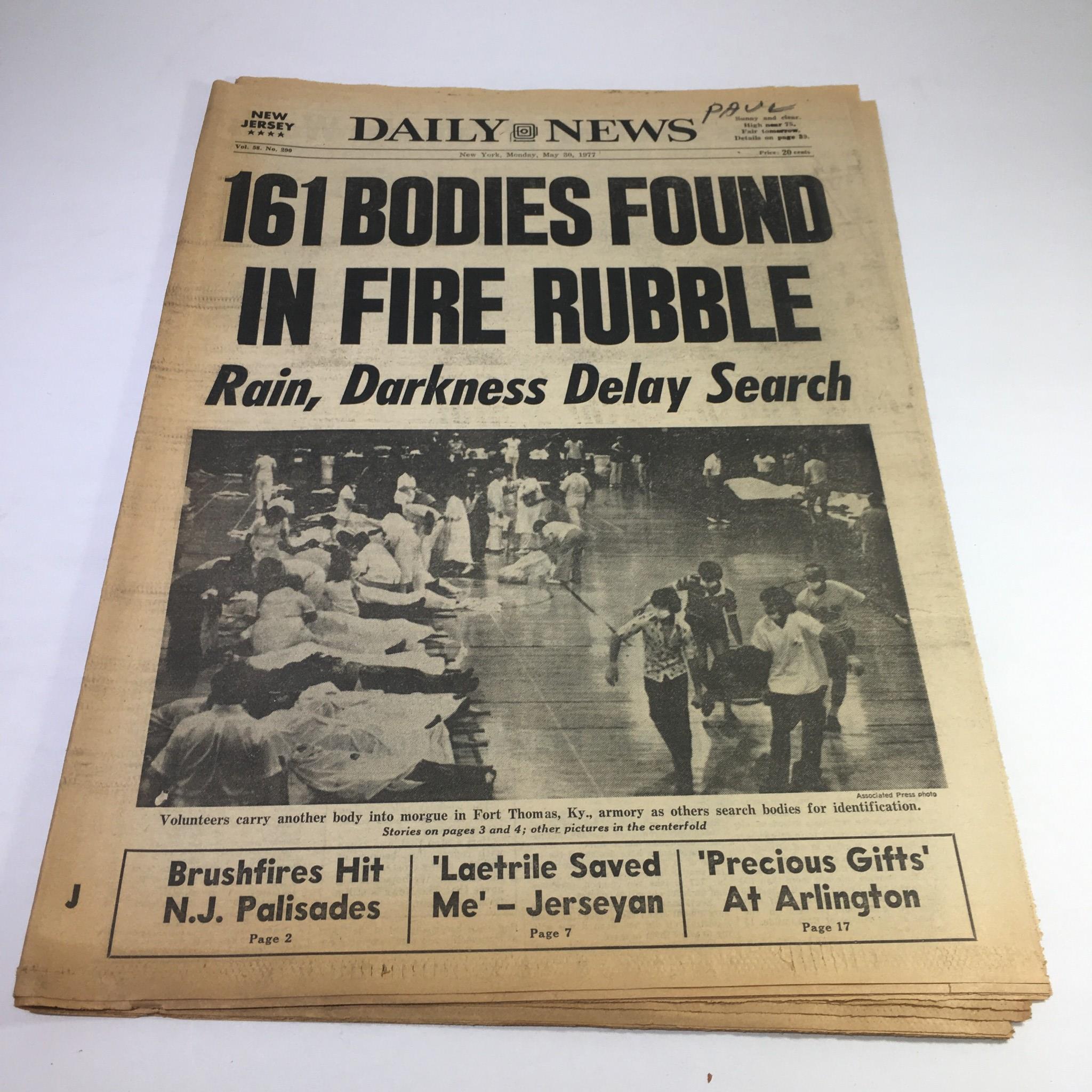 NY Daily News:5/30/77 161 Bodies Found In Fire Rubble Rain,Darkness Delay Search