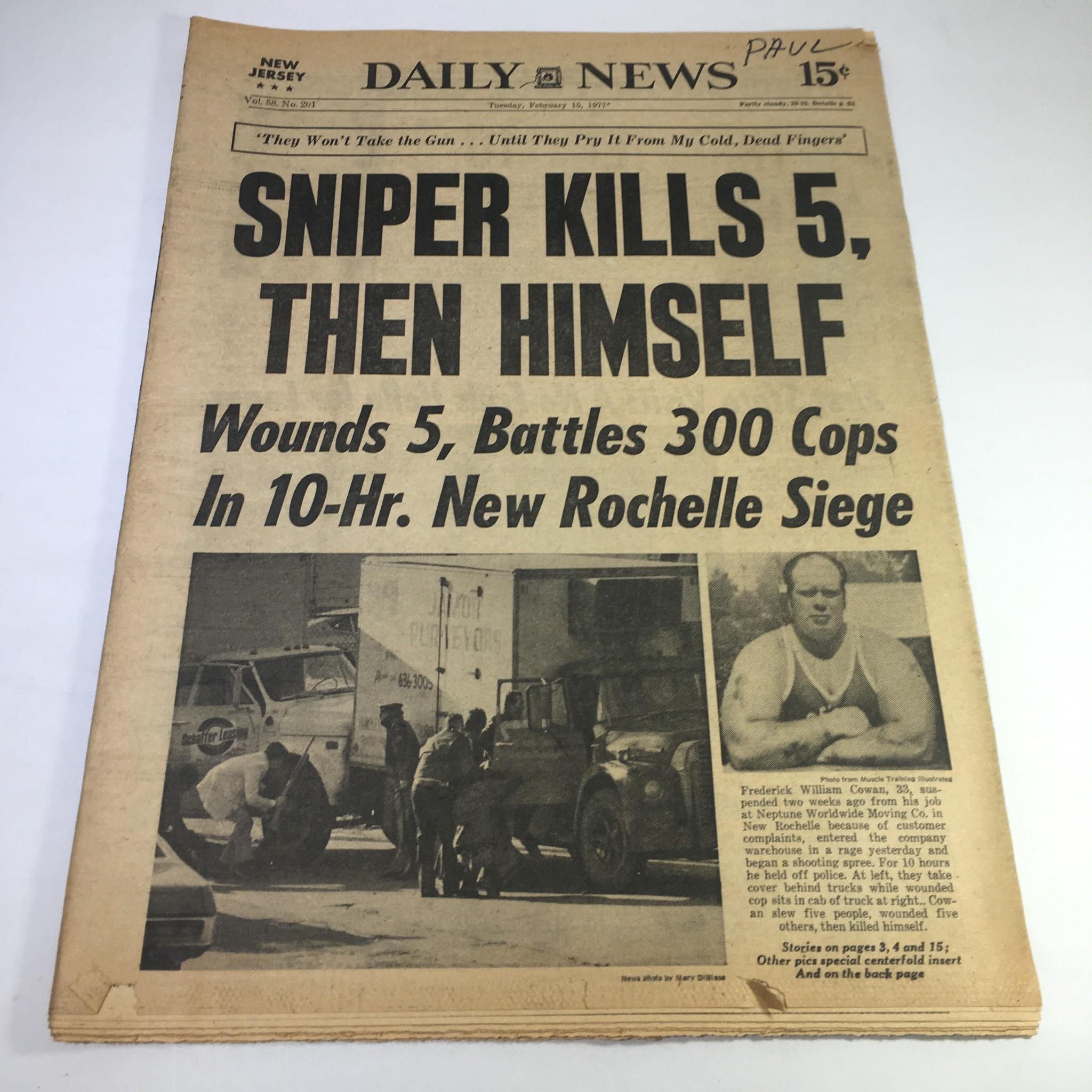 NY Daily News headline from February 15, 1977, reporting on a sniper who killed 5 and then himself, featuring details of the event, including a photo of law enforcement at the scene.