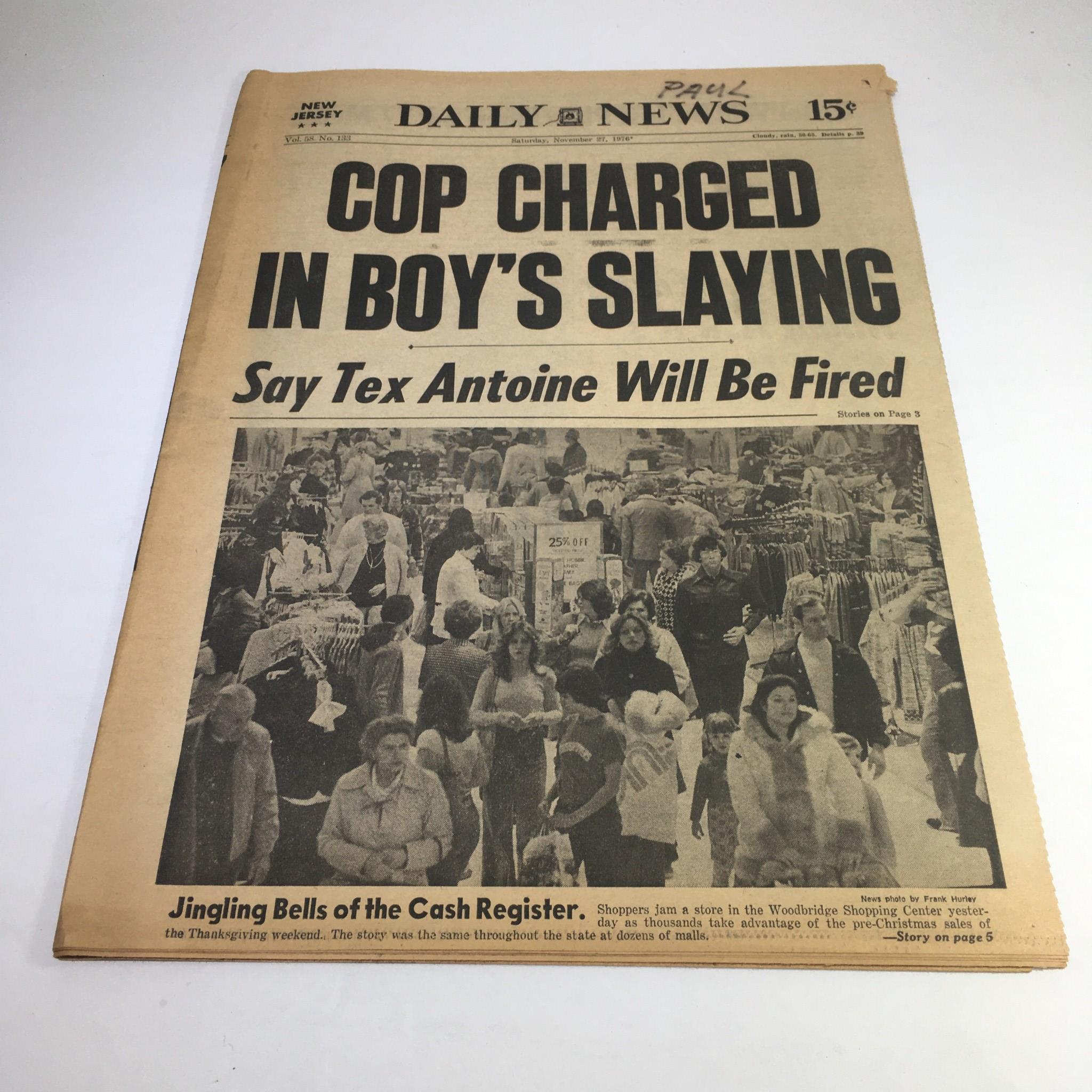 NY Daily News:11/27/76 Cop Charged In Boy's Slaying; Jingling Bells Of Cash Reg