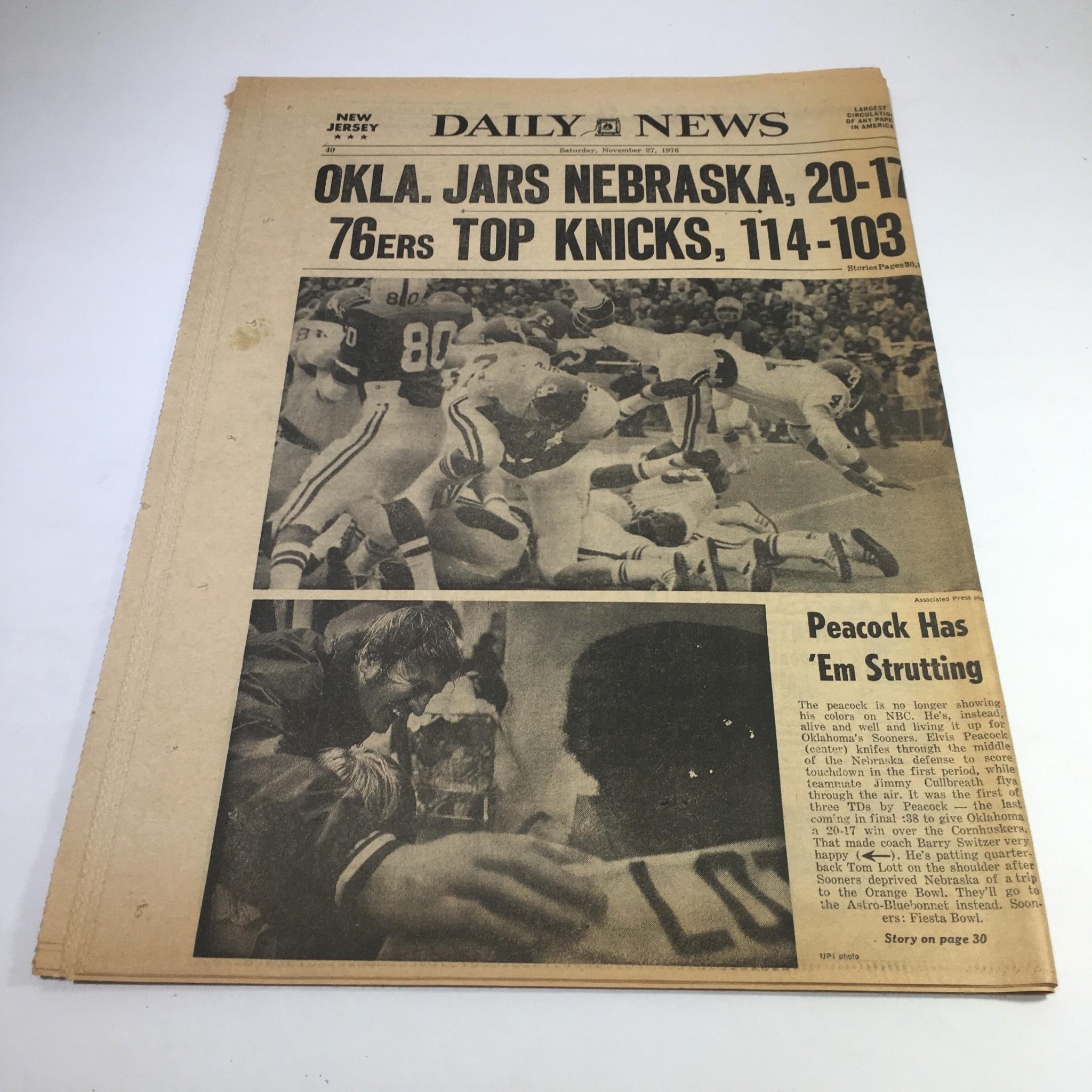 NY Daily News:11/27/76 Cop Charged In Boy's Slaying; Jingling Bells Of Cash Reg