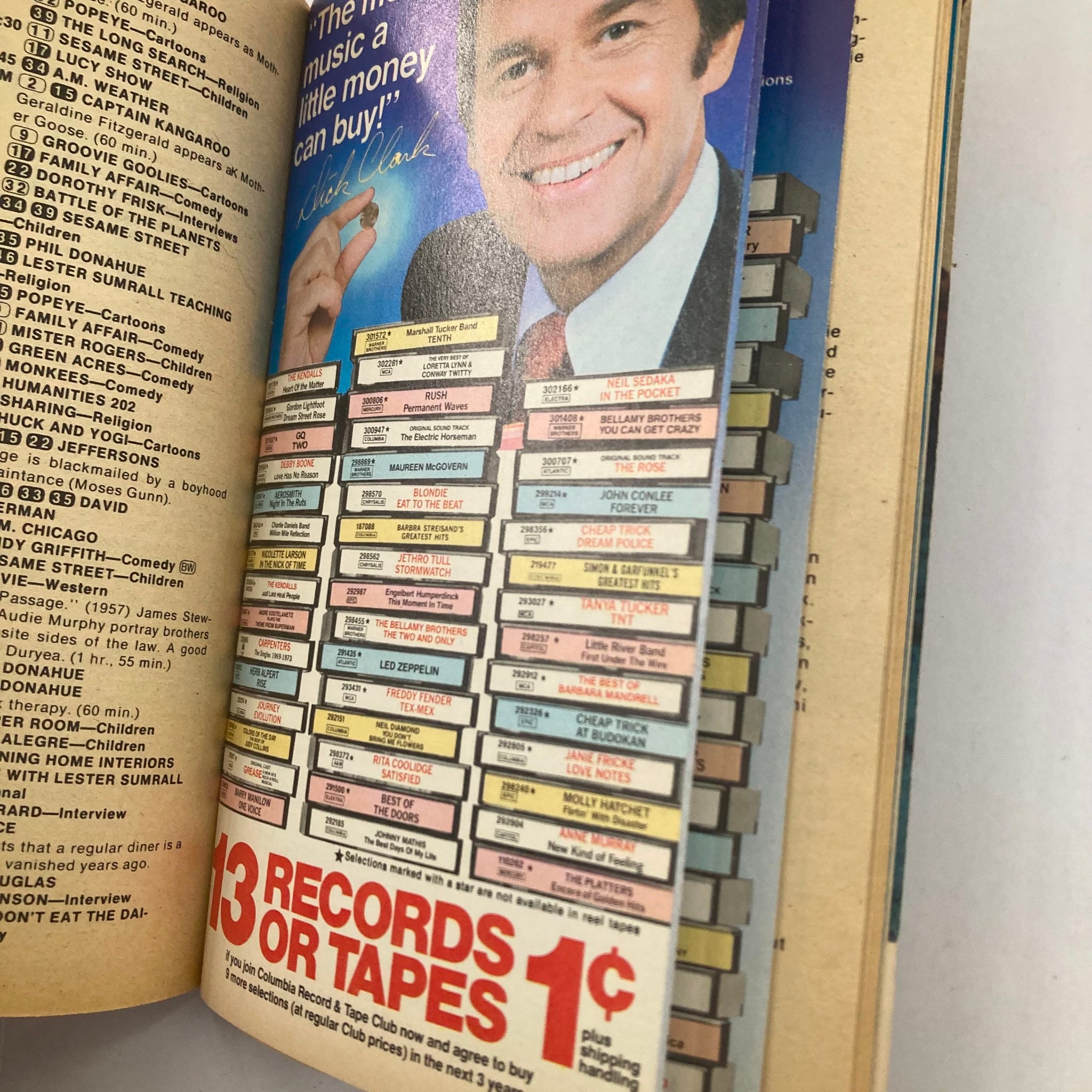 Inside page of TV Guide Magazine July 5 1980 showcasing a music advertisement featuring Mike Clark and the promotion for '13 Records or Tapes' for just 1 cent.