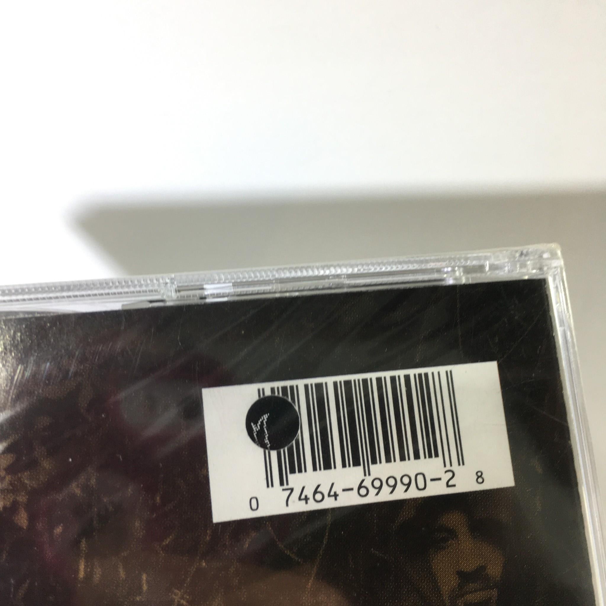 Close-up view of the barcode on 'Skull & Bones by Cypress Hill' Music Audio CD, showing cut-out copy detail.