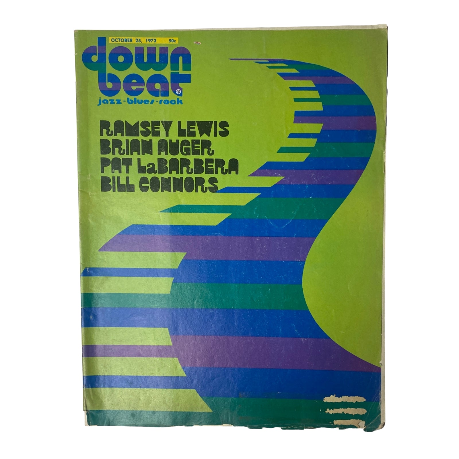 Cover of Down Beat Magazine dated October 25, 1973, featuring Ramsey Lewis, Brian Auger, and colorful abstract design.