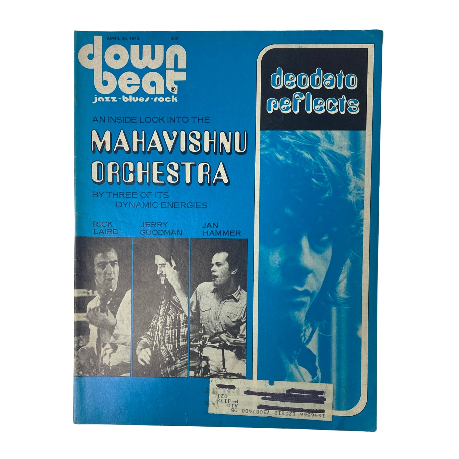 Down Beat Magazine cover from April 26, 1973, featuring the Mahavishnu Orchestra. The cover includes images of band members Rick Laird, Jerry Goodman, and Jan Hammer, highlighting an inside look into their dynamic energies. The magazine focuses on jazz, blues, and rock.