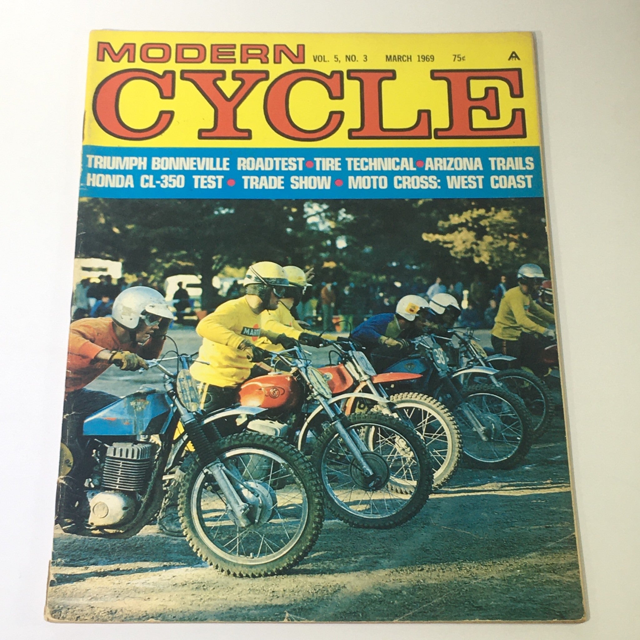 Cover of VTG Modern Cycle Magazine March 1969 featuring a Triumph Bonneville road test and Honda CL350 test, showcasing motorcycle culture with vibrant colors and riders.