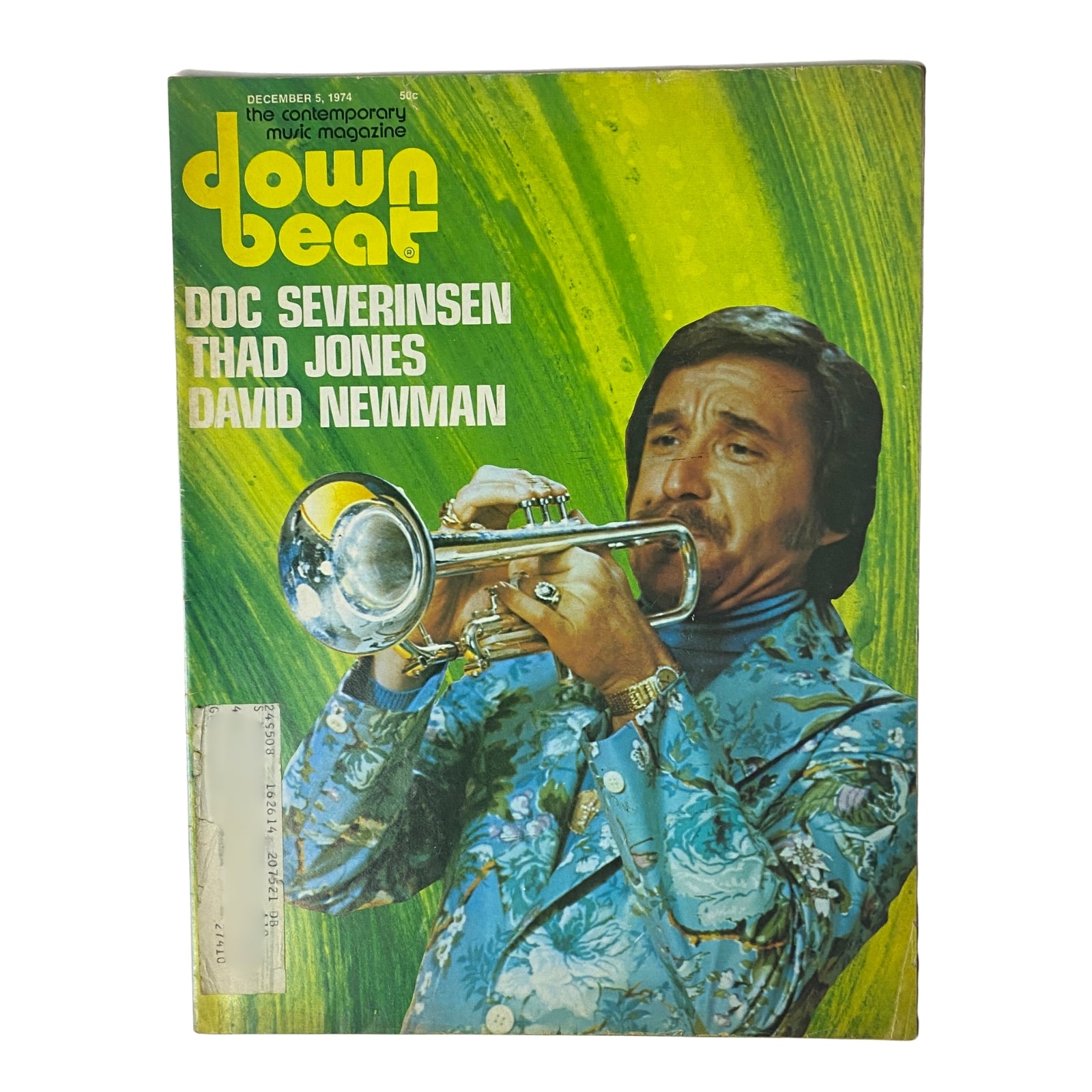 Cover of Down Beat Magazine, December 5, 1974, featuring Doc Severinsen playing trumpet, with headlines about Thad Jones and David Newman, showcasing vibrant colors and retro design.