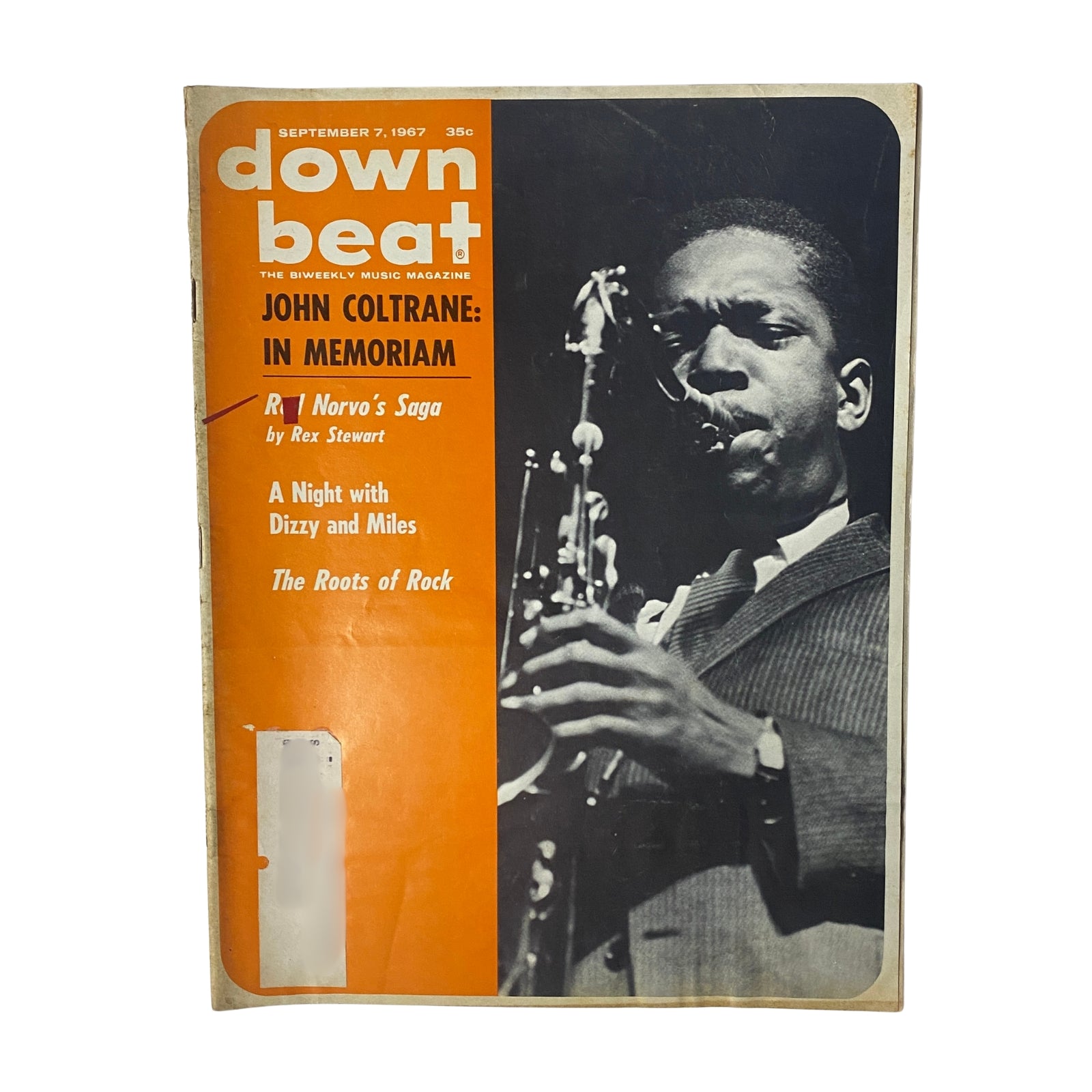 Cover of Down Beat Magazine, September 7, 1967, featuring a tribute to John Coltrane, showcasing a photograph of a saxophonist, with highlights on musicians like Dizzy Gillespie and Miles Davis.