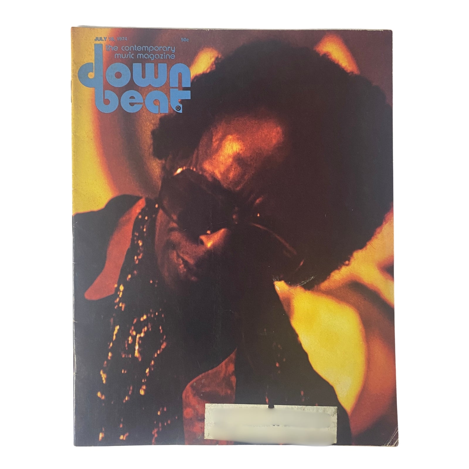 Down Beat Magazine July 18, 1974 Vol 41 No. 13 featuring a vibrant cover photo of Miles Davis, showcasing the influential jazz musician in dramatic lighting.