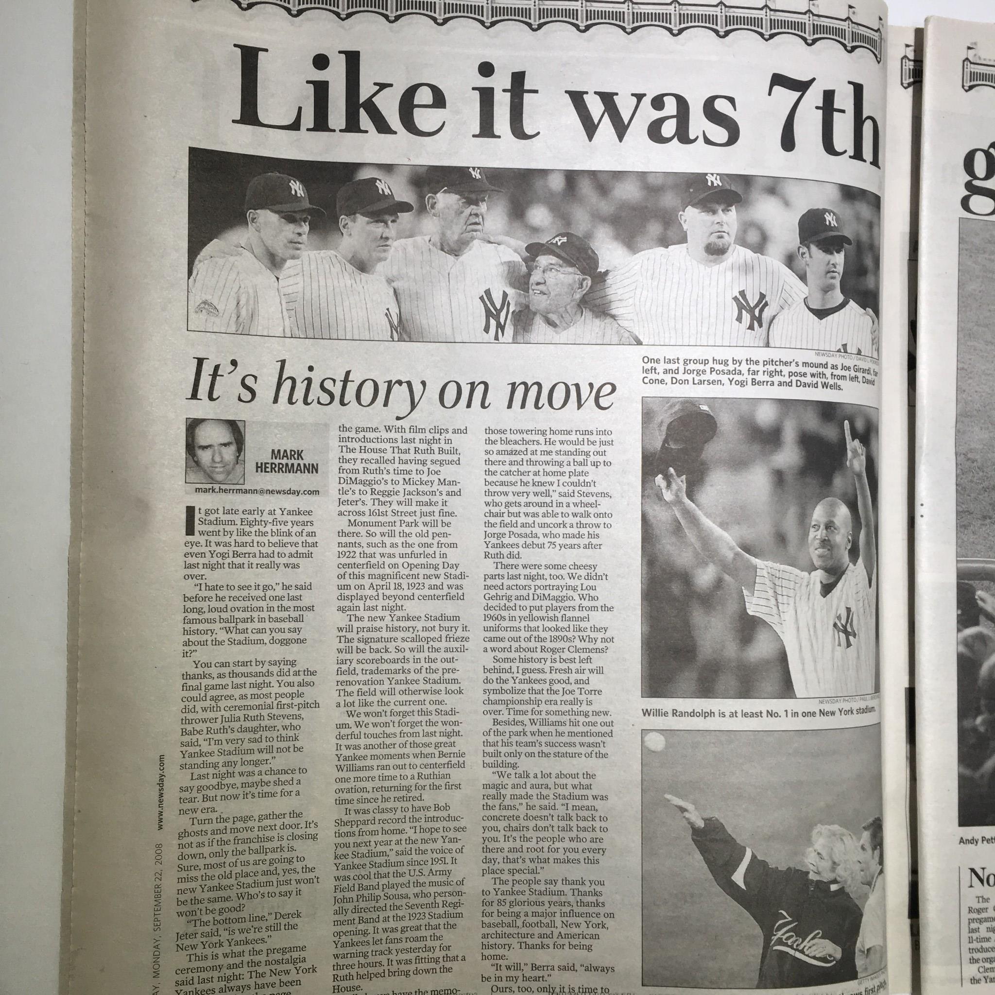 Yankees players discussing strategy during the final game, as seen in the article 'Like it was 7th' from Newsday: Sept 22 2008 Yankee Stadium 1923-2008 It's Really Over.