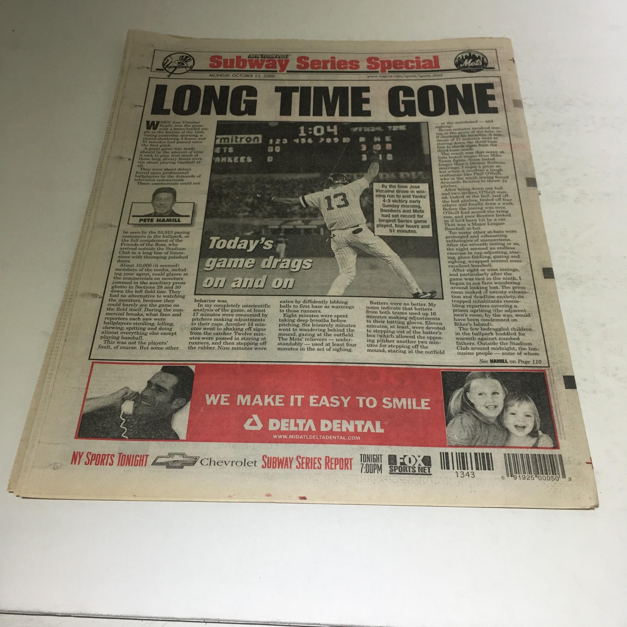 Another edition of the New York Post showcasing the headline 'LONG TIME GONE' related to the Subway Series on October 23, 2000.