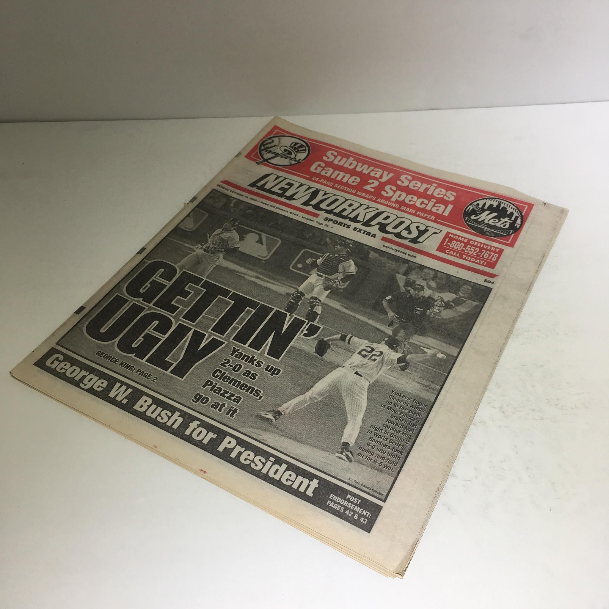 Cover of the New York Post dated October 23, 2000, featuring the headline 'Gettin' Ugly.' The image showcases a vintage sports-themed newspaper with details about the Subway Series Game 2 Special and George W. Bush for President.